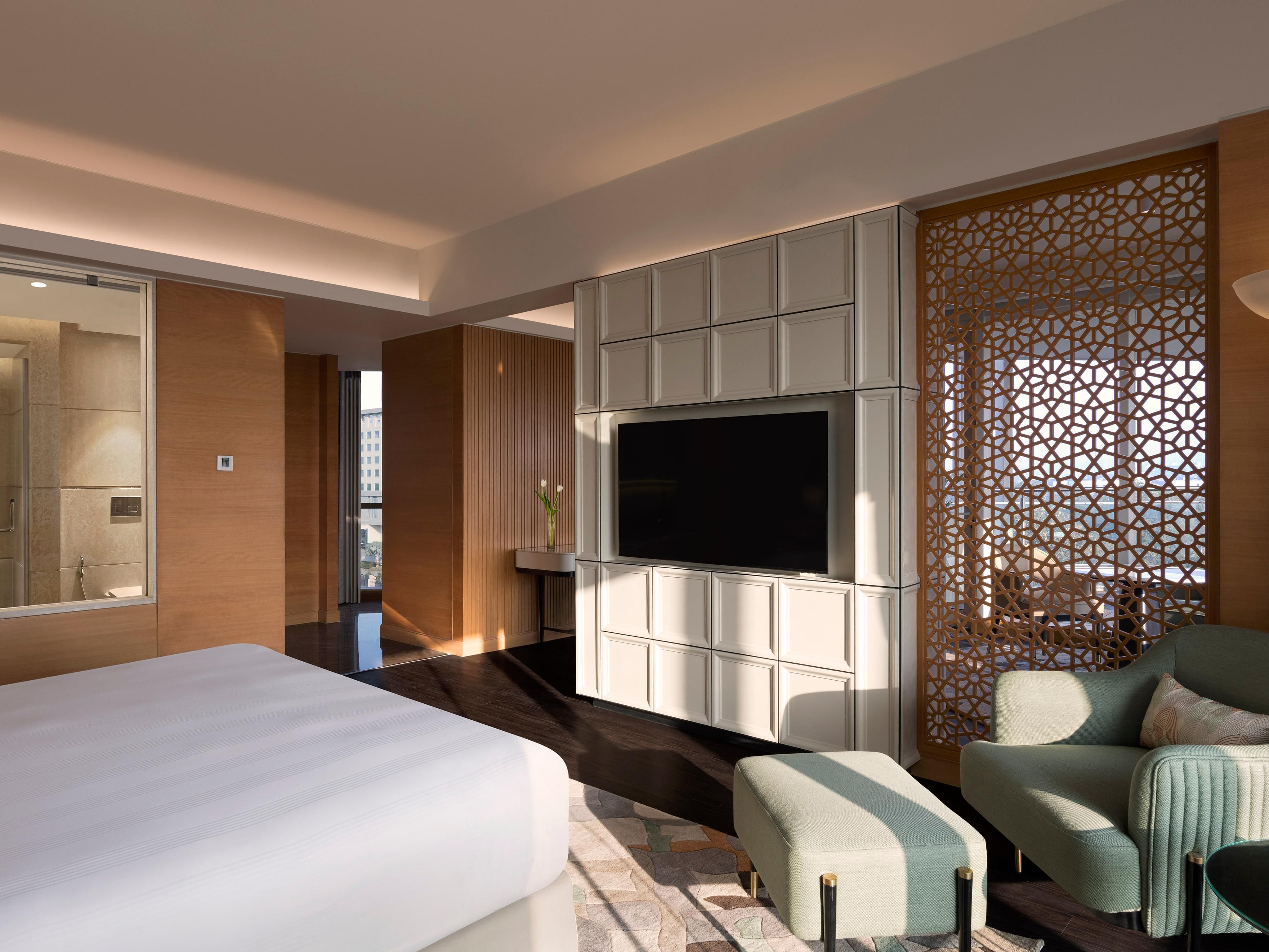 Elegant Royal Suite bedroom with floor-to-ceiling windows