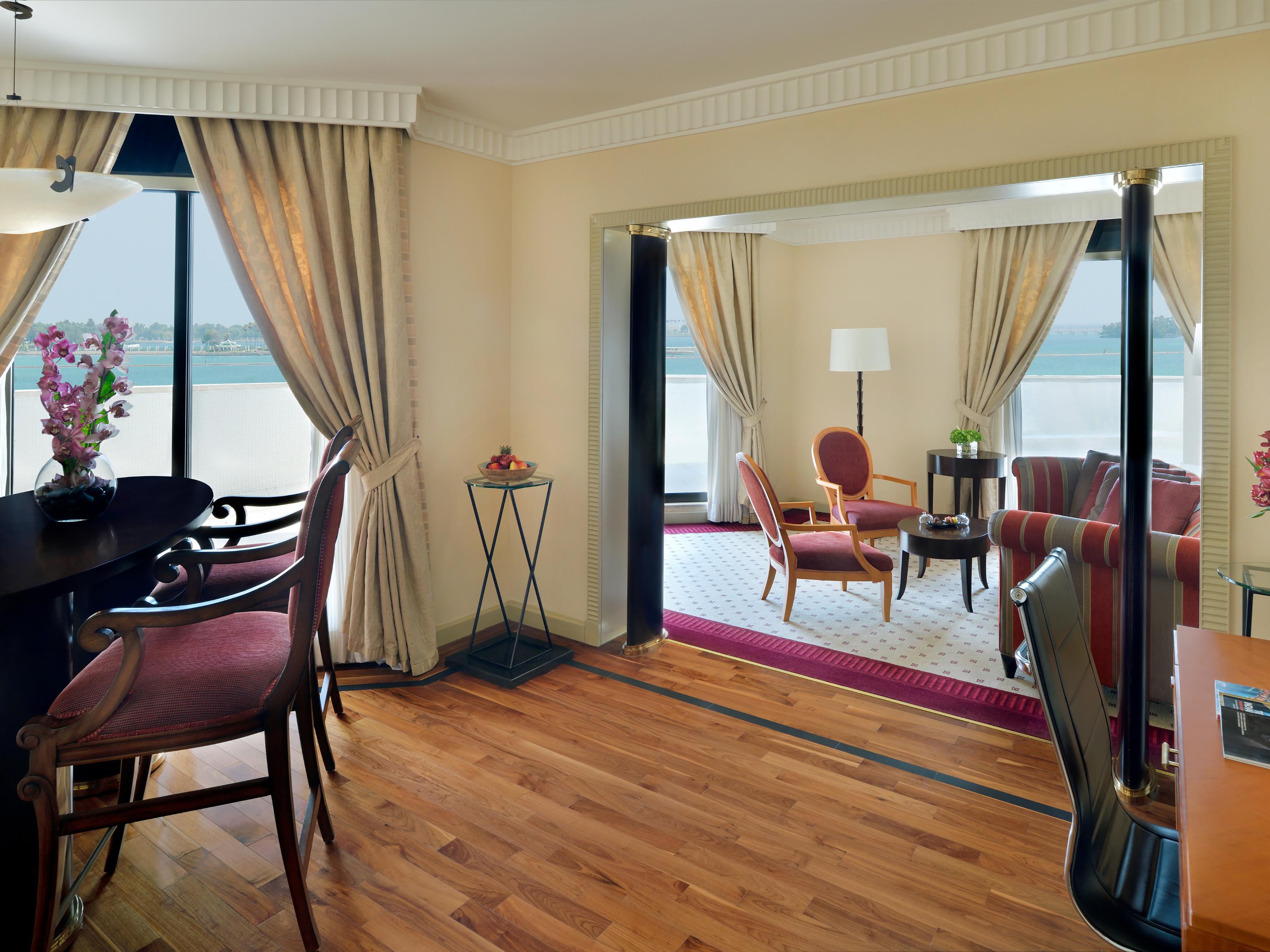 The luxury living and dining room of the Diplomatic Suite