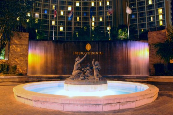 Illuminated fountain outside the InterContinental hotel at night