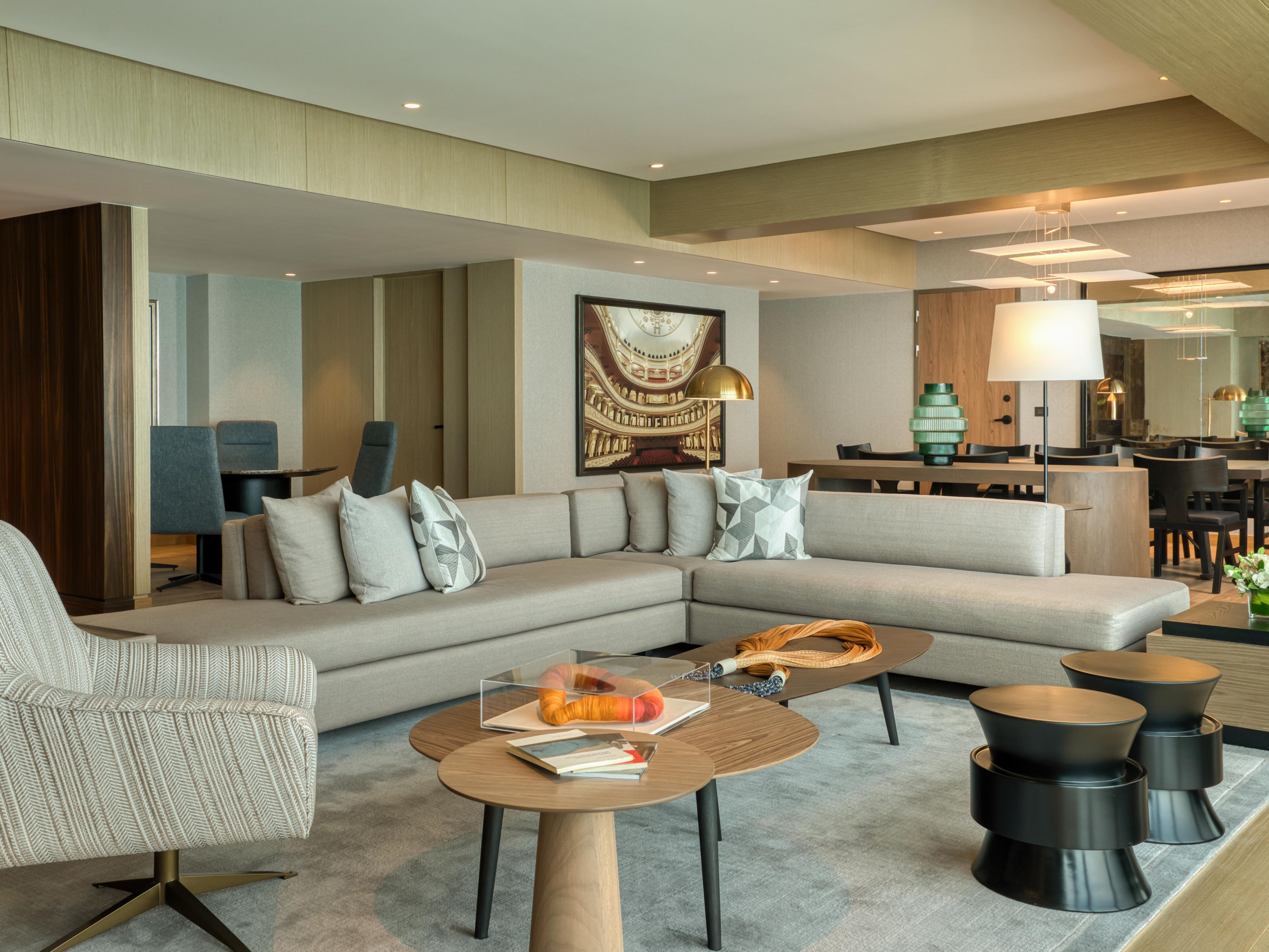 Luxurious presidential suite with elegant furnishings, and spacious living area.