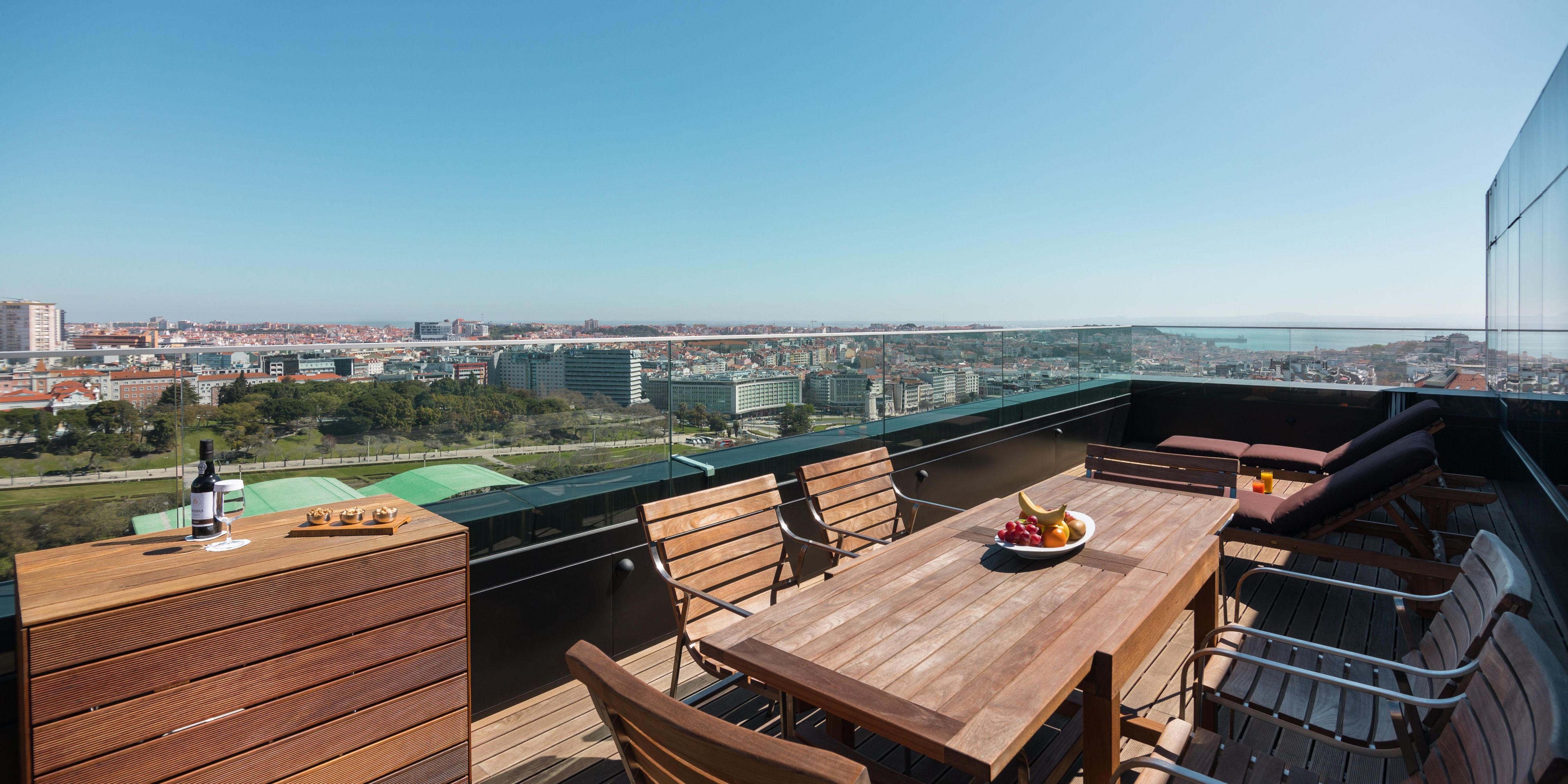 Enjoy a large private terrace with panoramic views over the city.