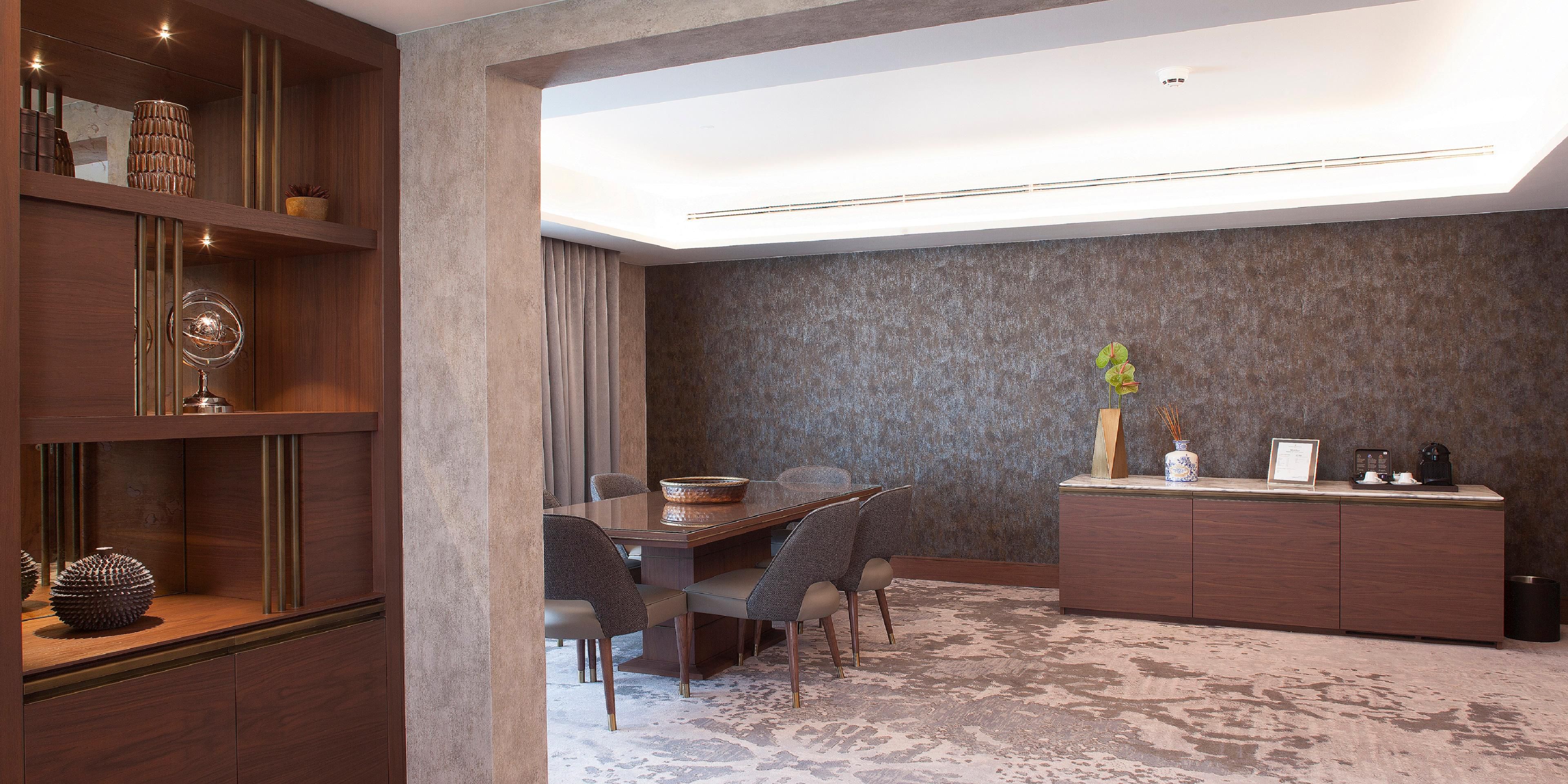 The 2 Bedroom Suite presents an intimate dining area for six