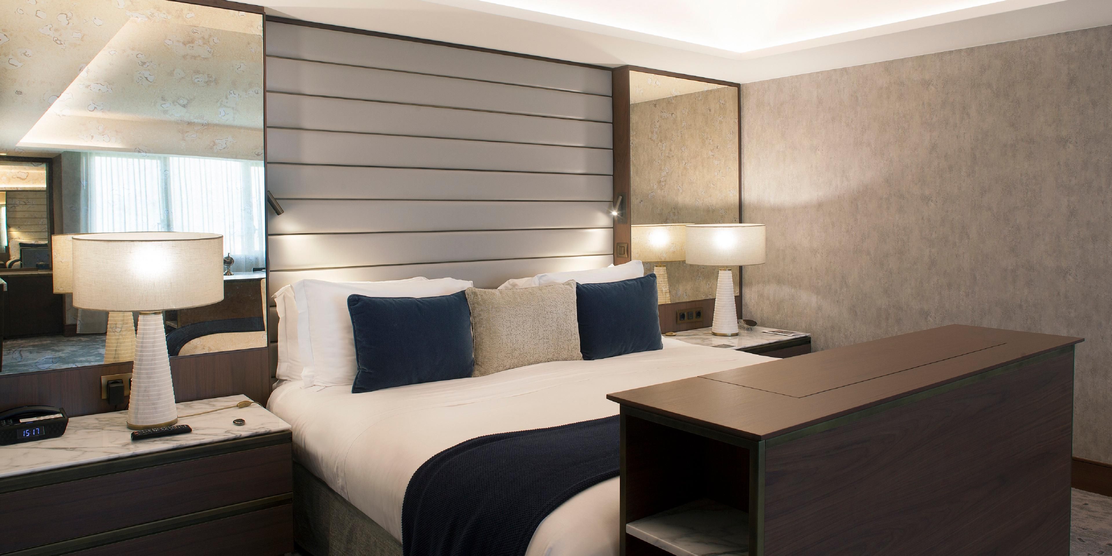This incredible bedroom has a built in tv at the feet of the bed! 