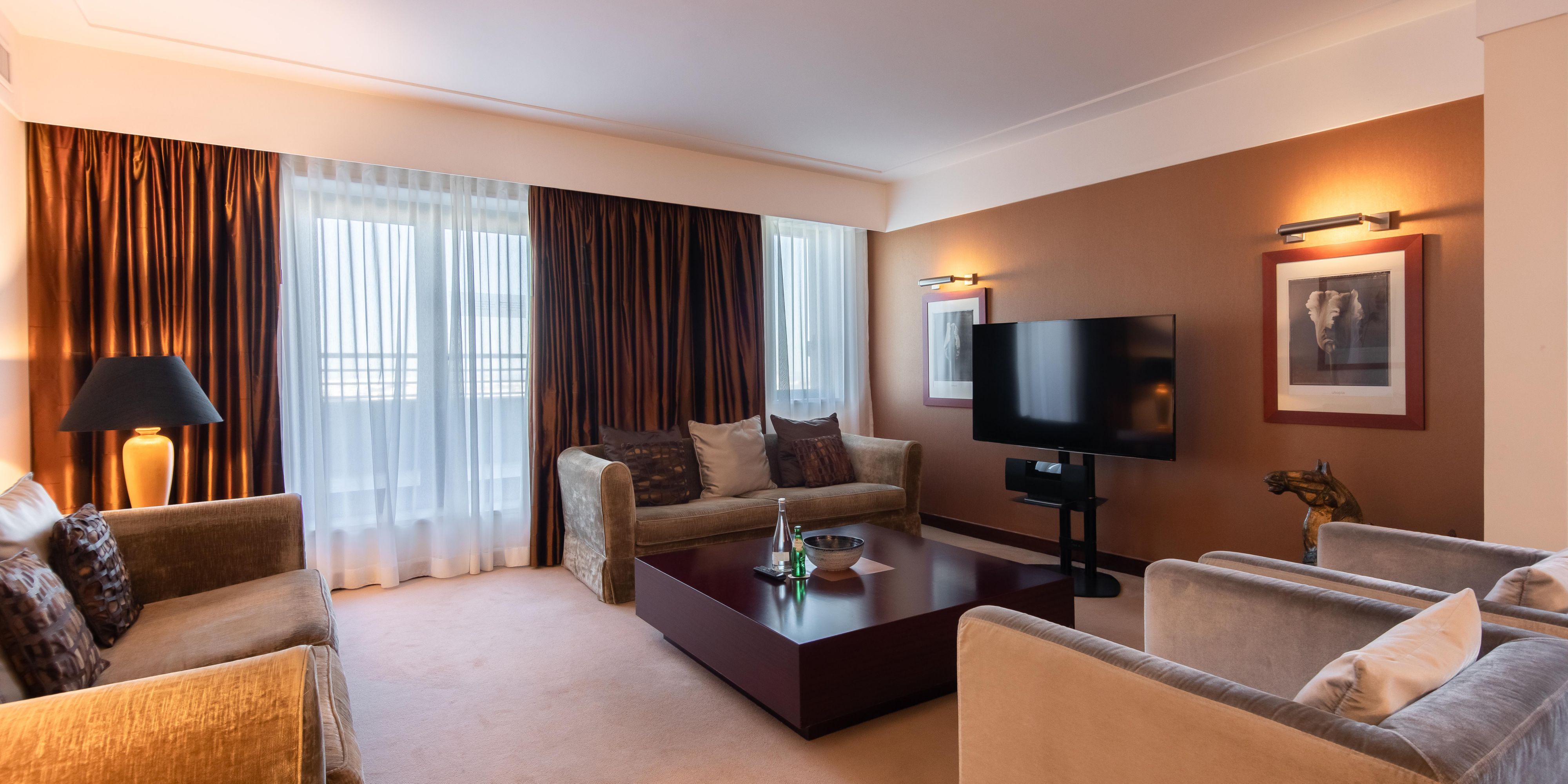 The Panoramic Suite has a living area as well as a dinning area.