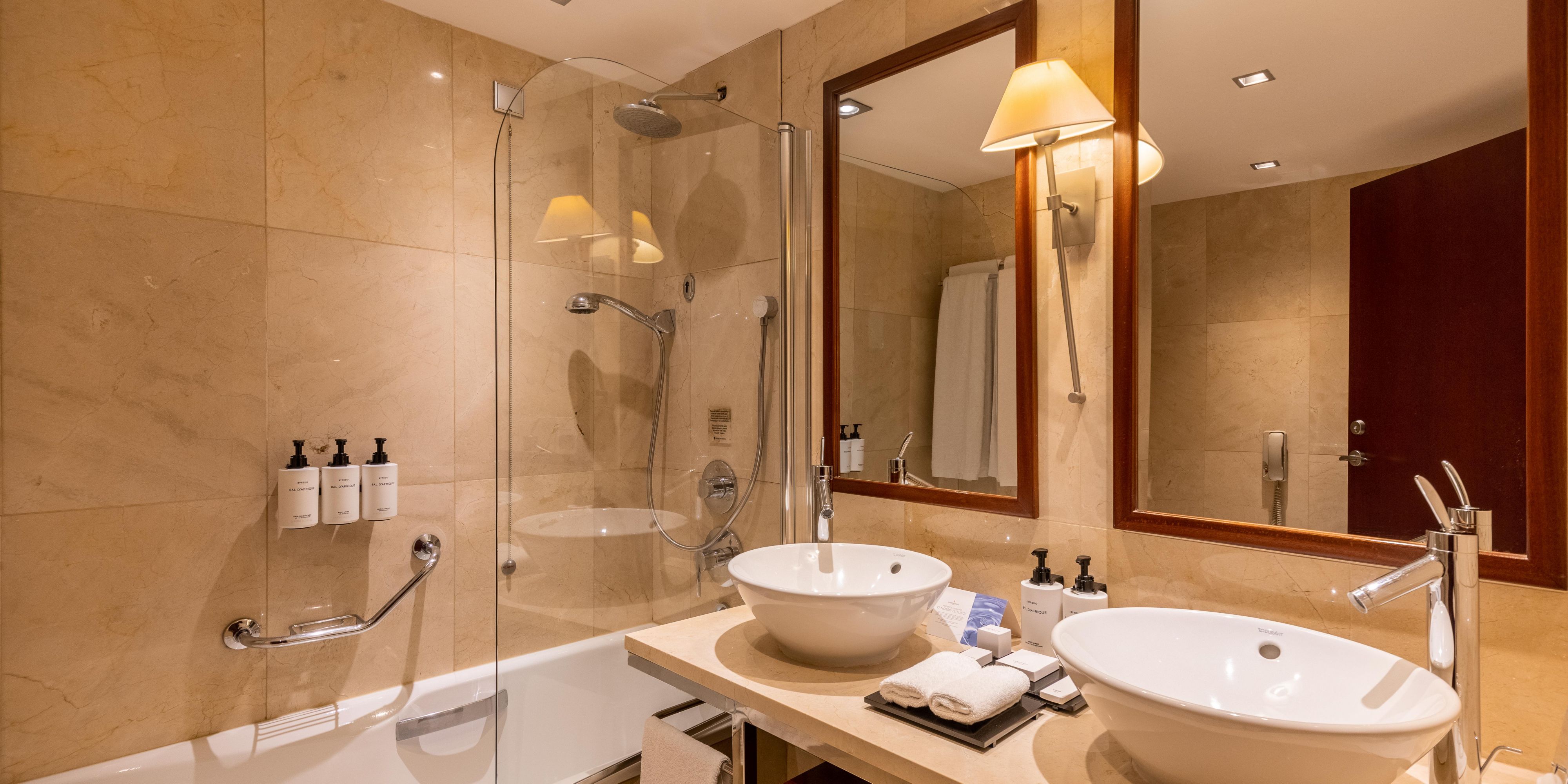 The Panoramic Suite features two bathrooms with bathtub.