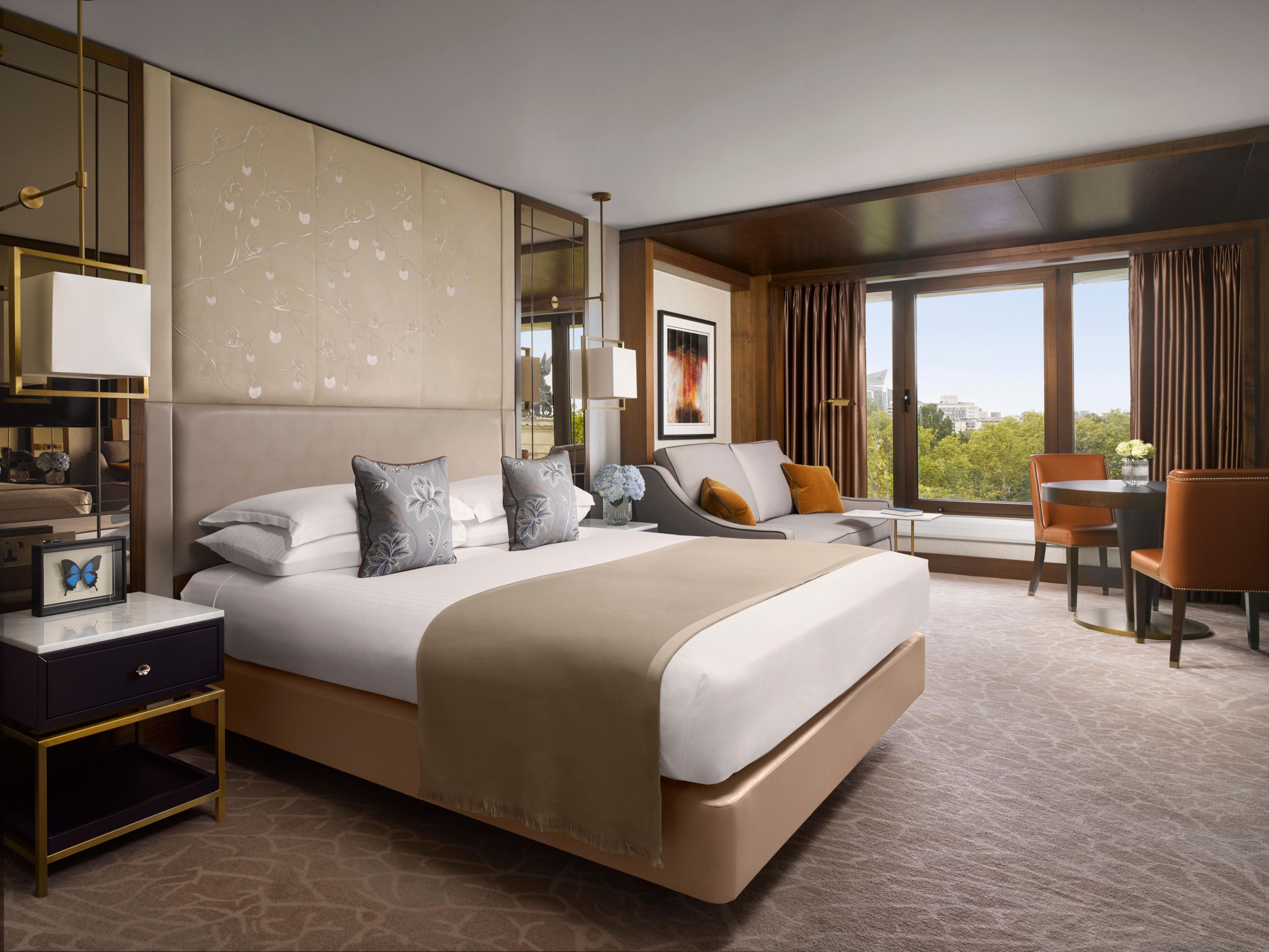 Mayfair Studio Suite, with large bed, city views, and grand interior