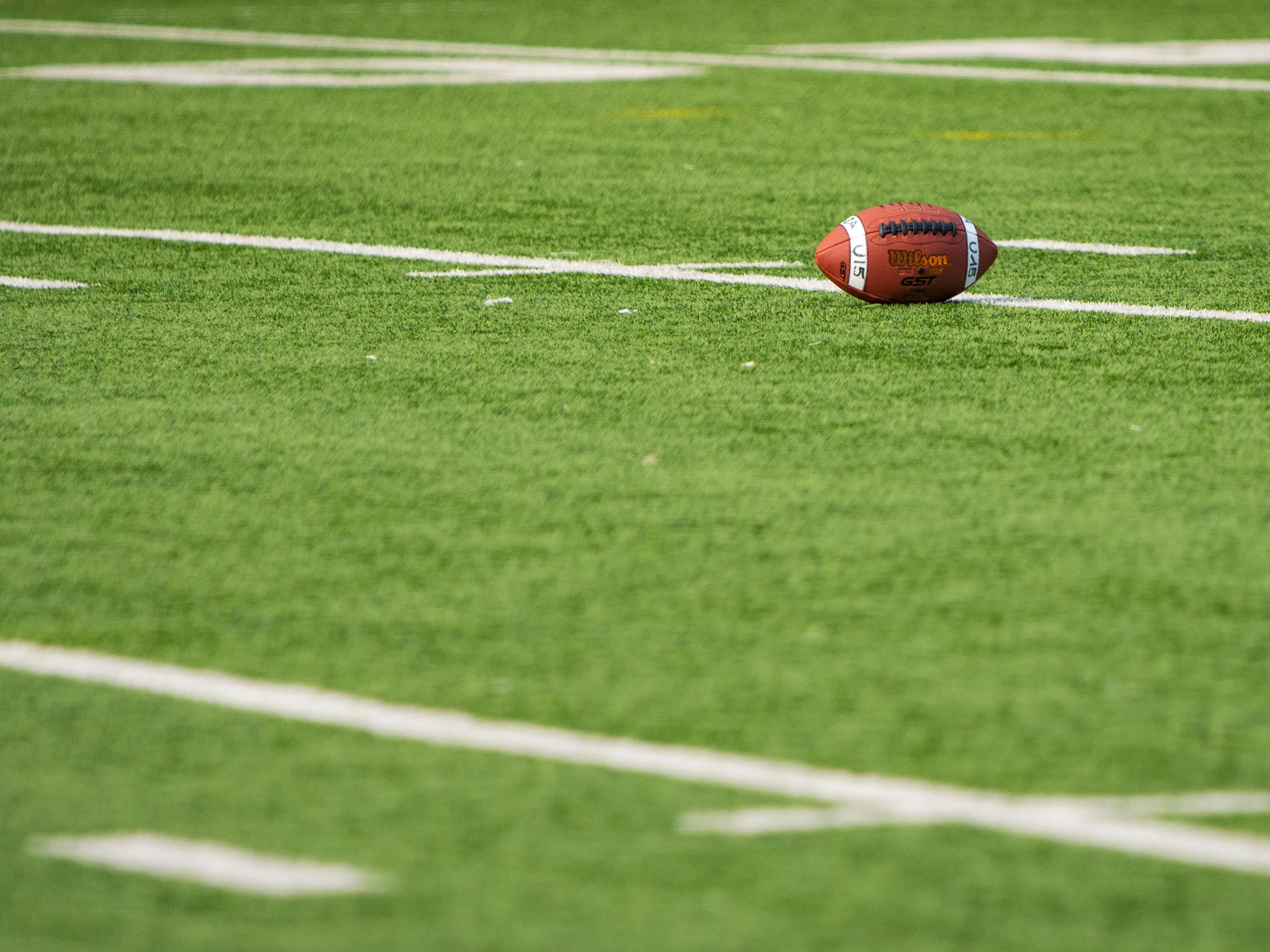 Football on field in Houston