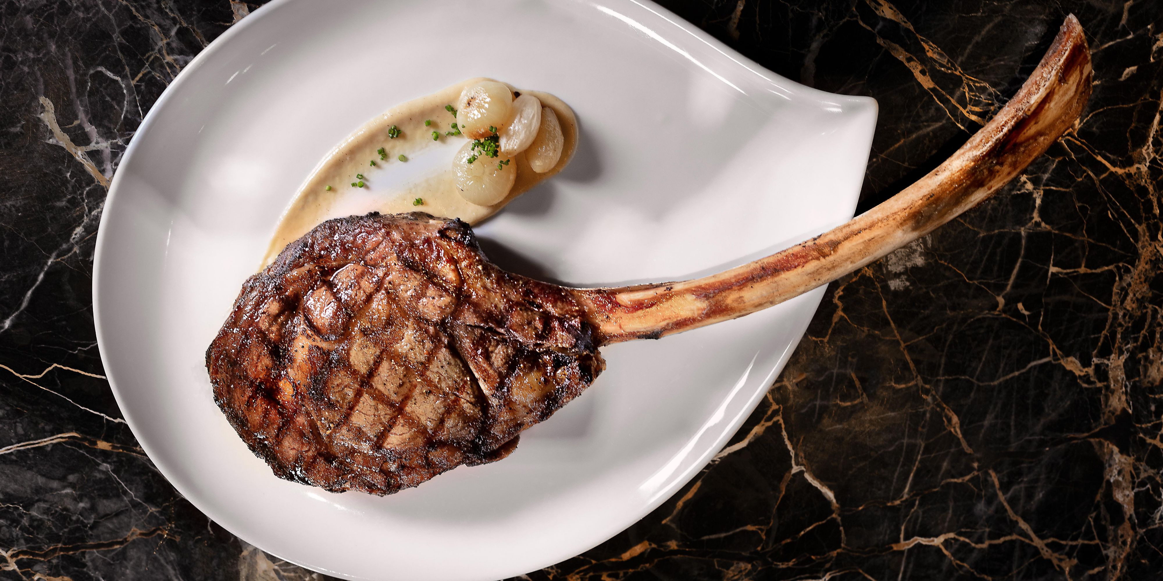 impressive tomahawk steak at la boucherie