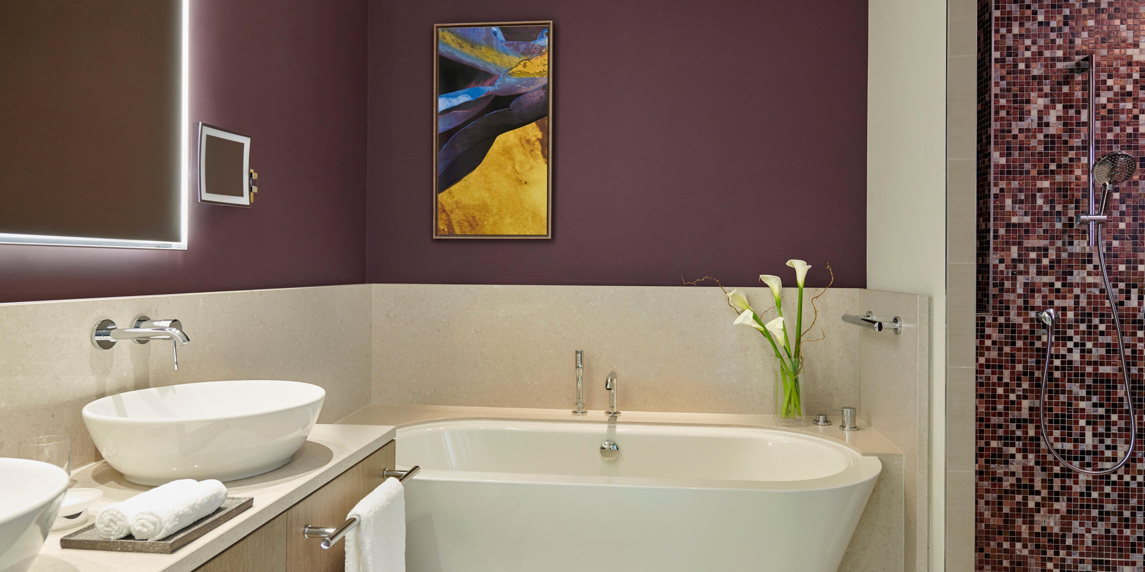 Bathroom with bathtub and spacious italian shower