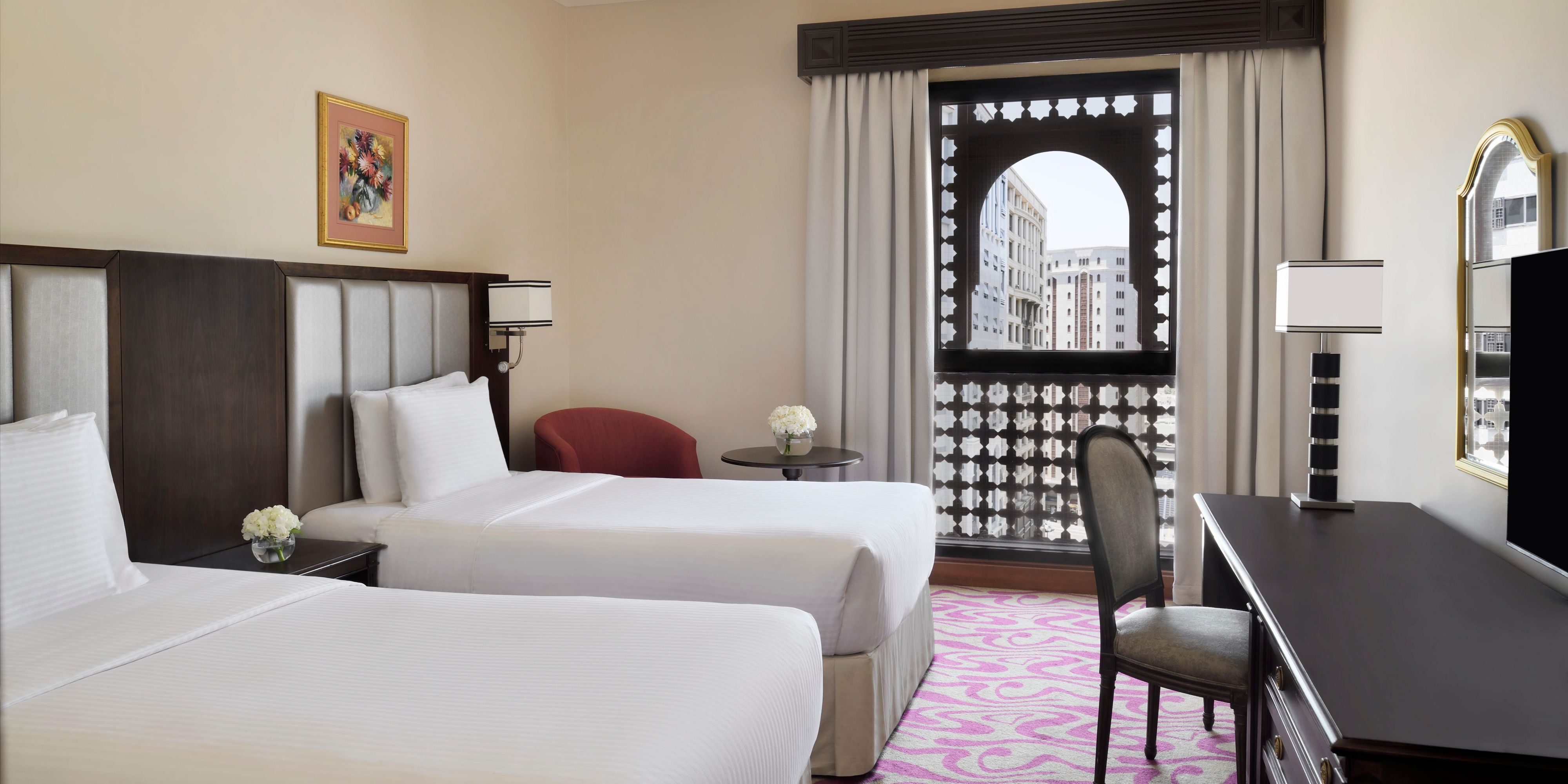 Enjoy luxury in our spacious rooms and city views