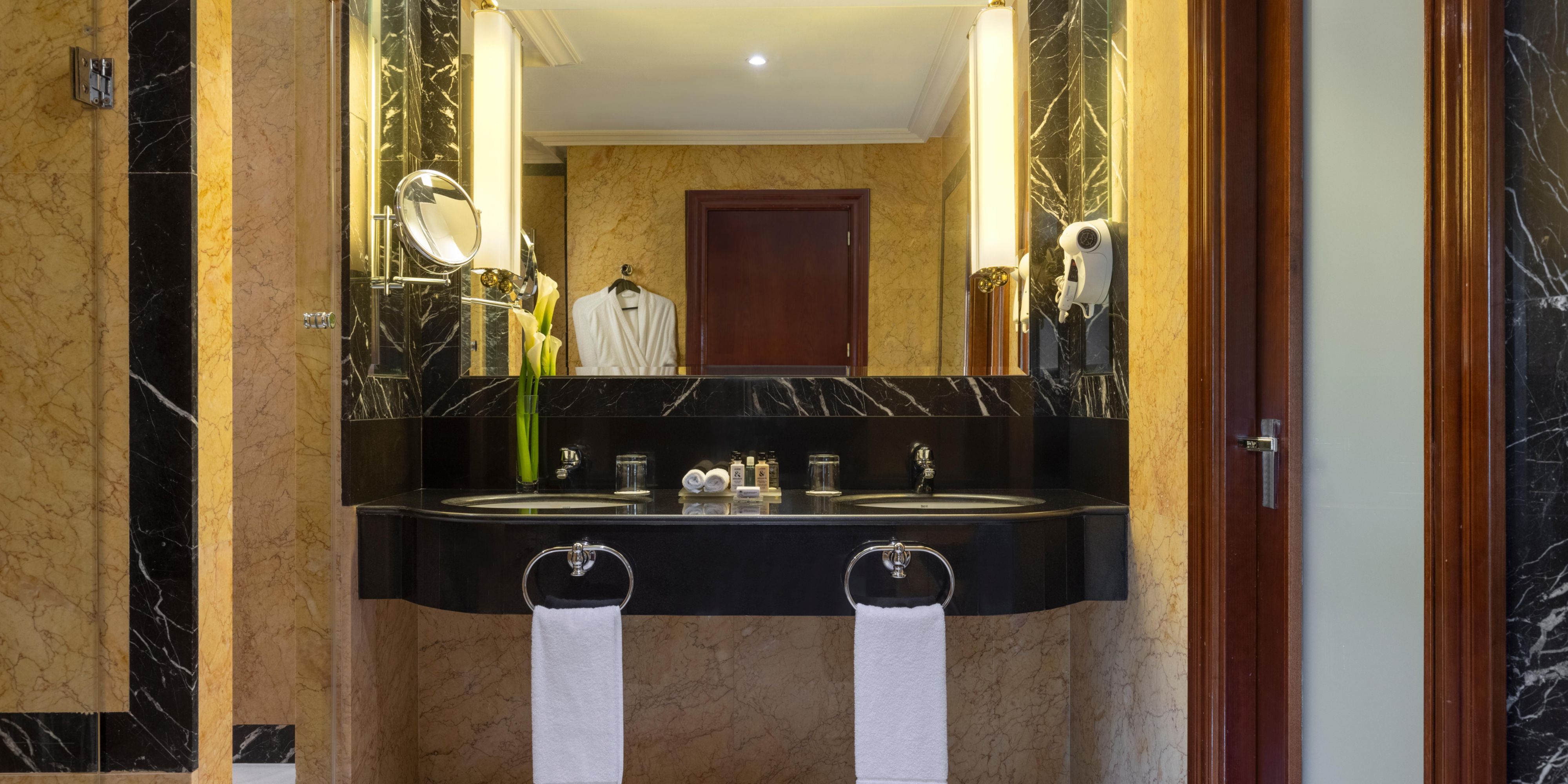 Luxury marble bathroom with bathtub and large separate shower
