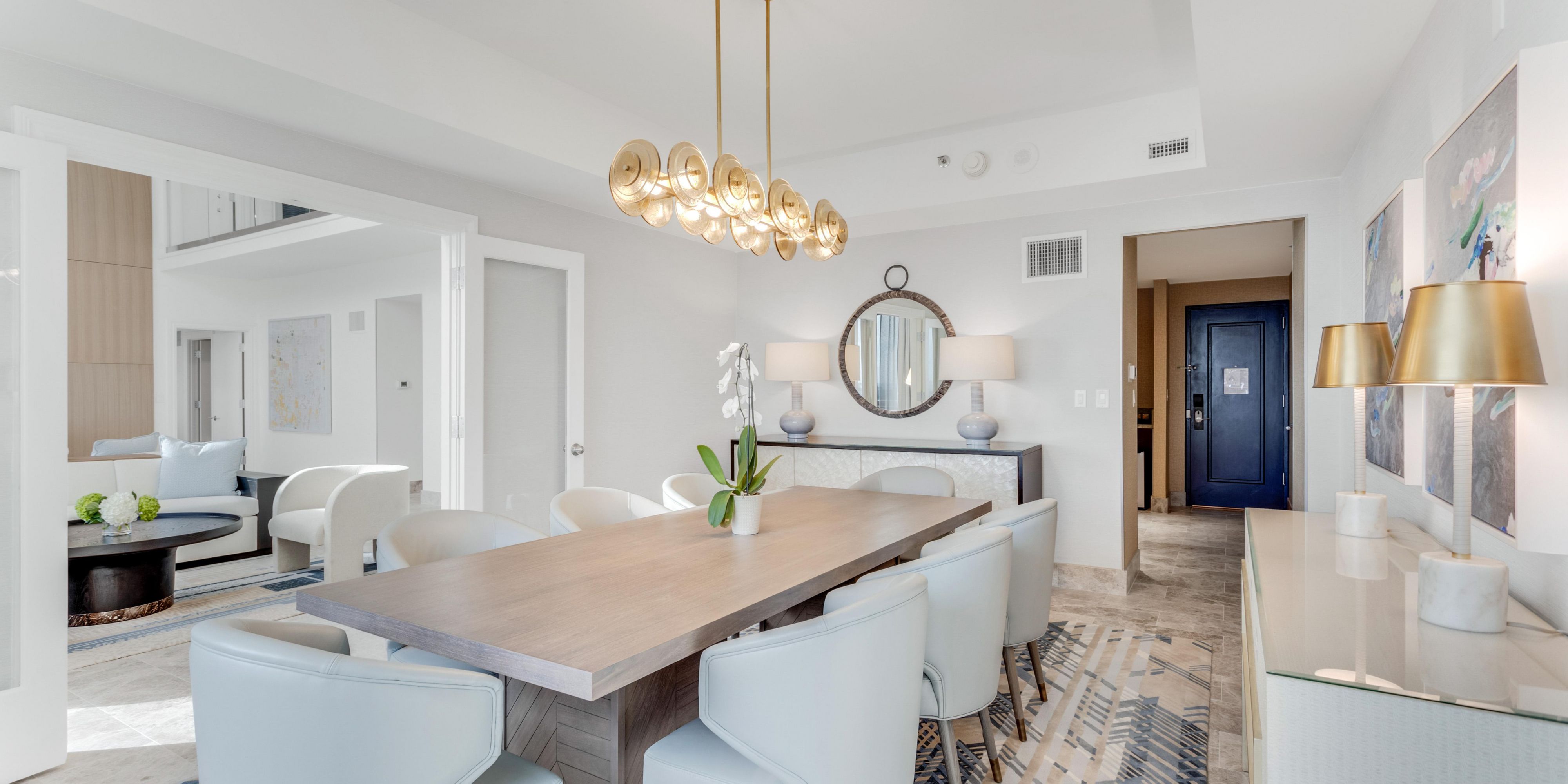 Savor moments in the suite’s beautifully appointed dining room.