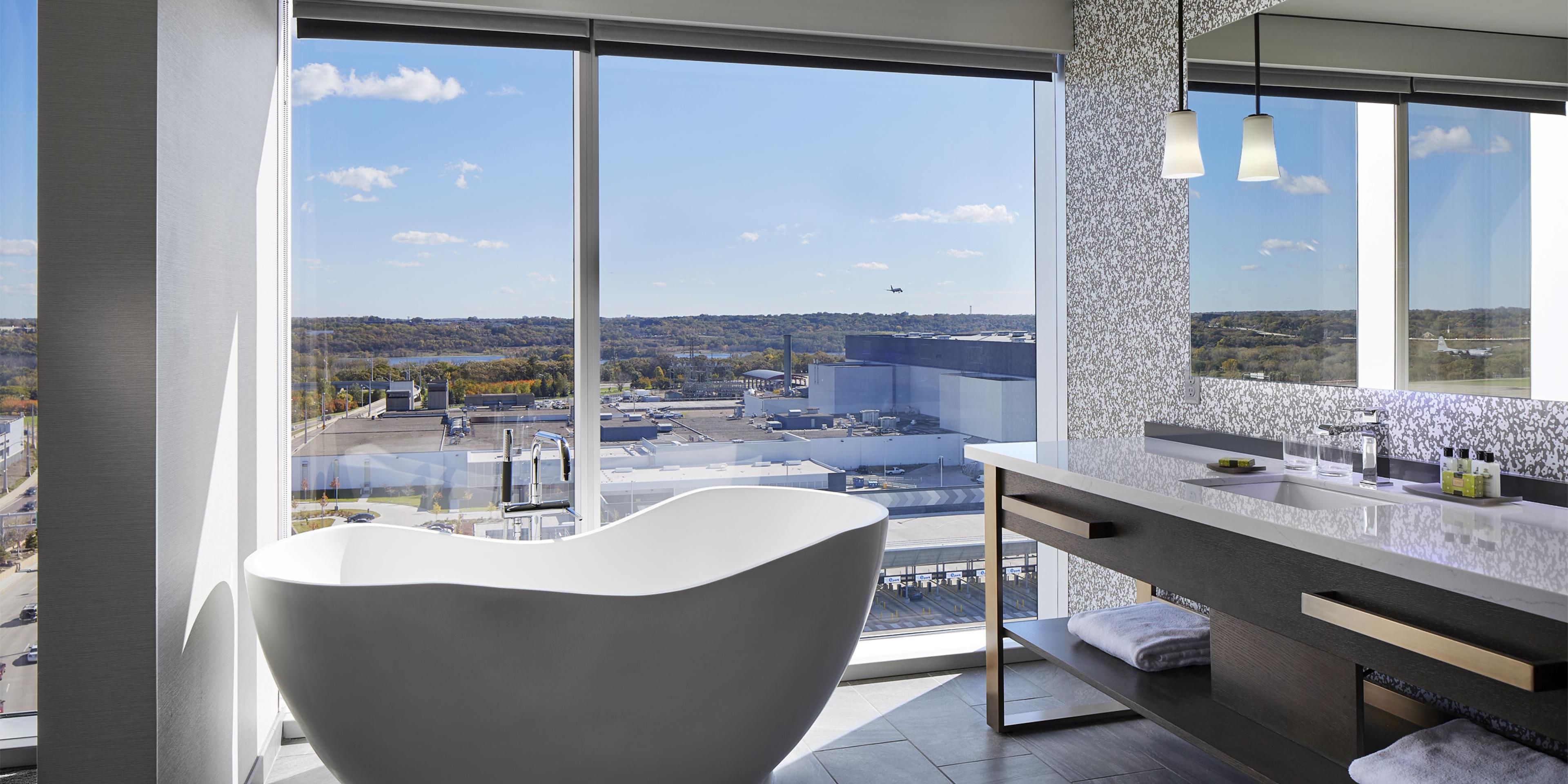 Relax with great views and luxurious amenities in our suites