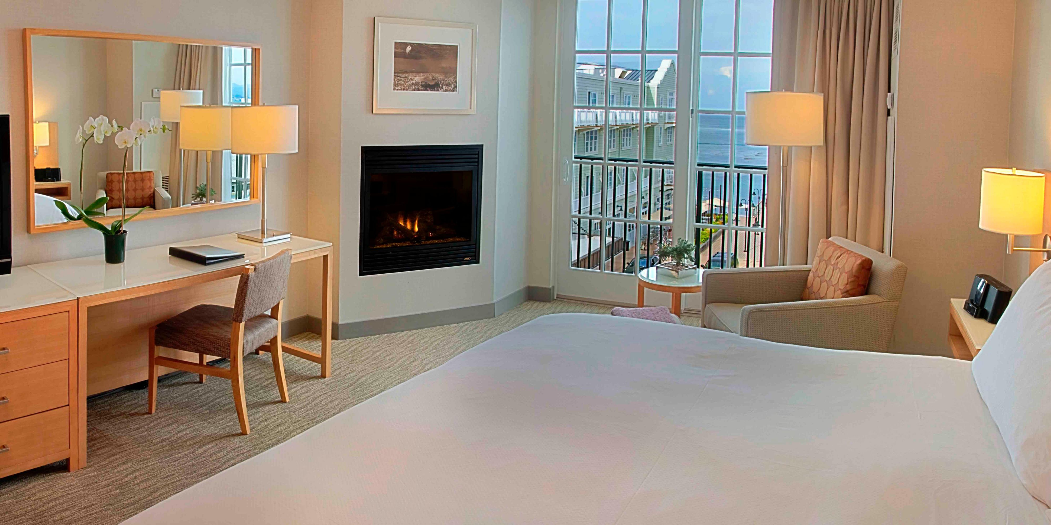 Classic King guest room with fireplace and Monterey Bay view