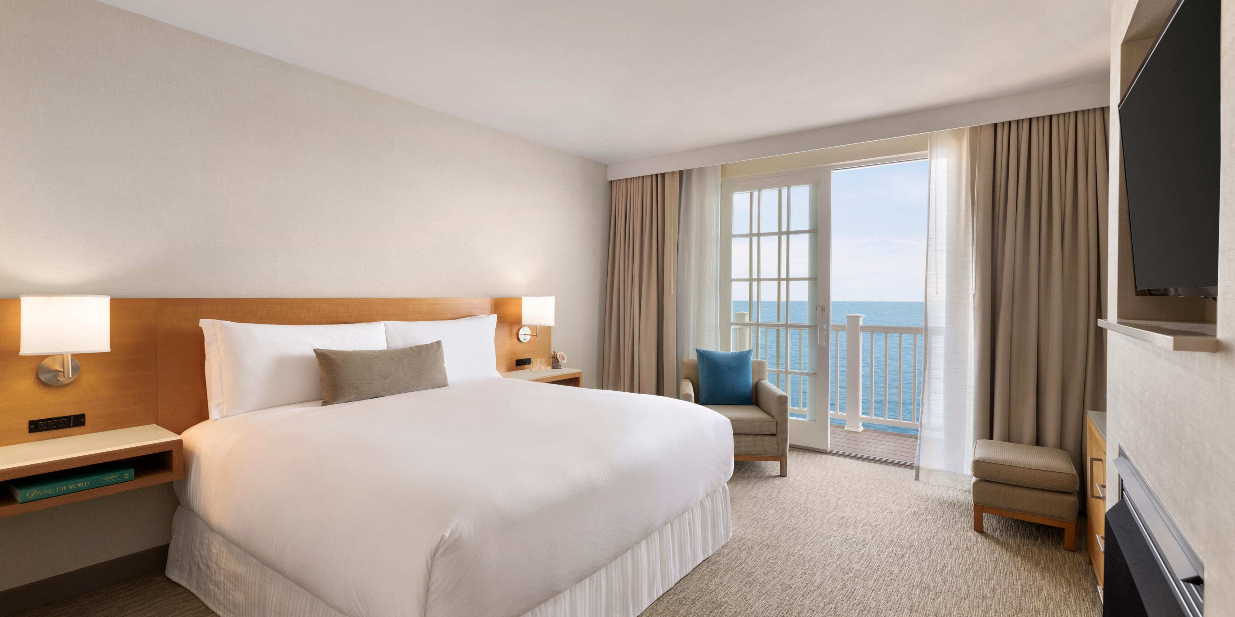 King bed ocean front suite with fireplace at our Monterey hotel