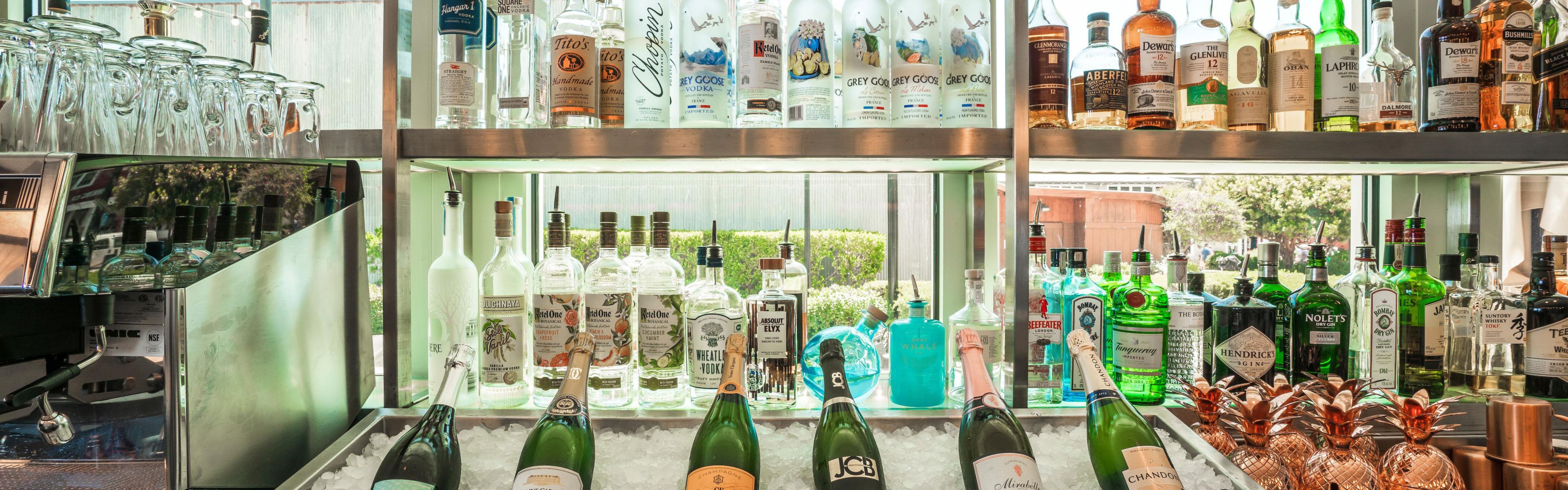 The C Bar --  liquor and champagne behind the bar.