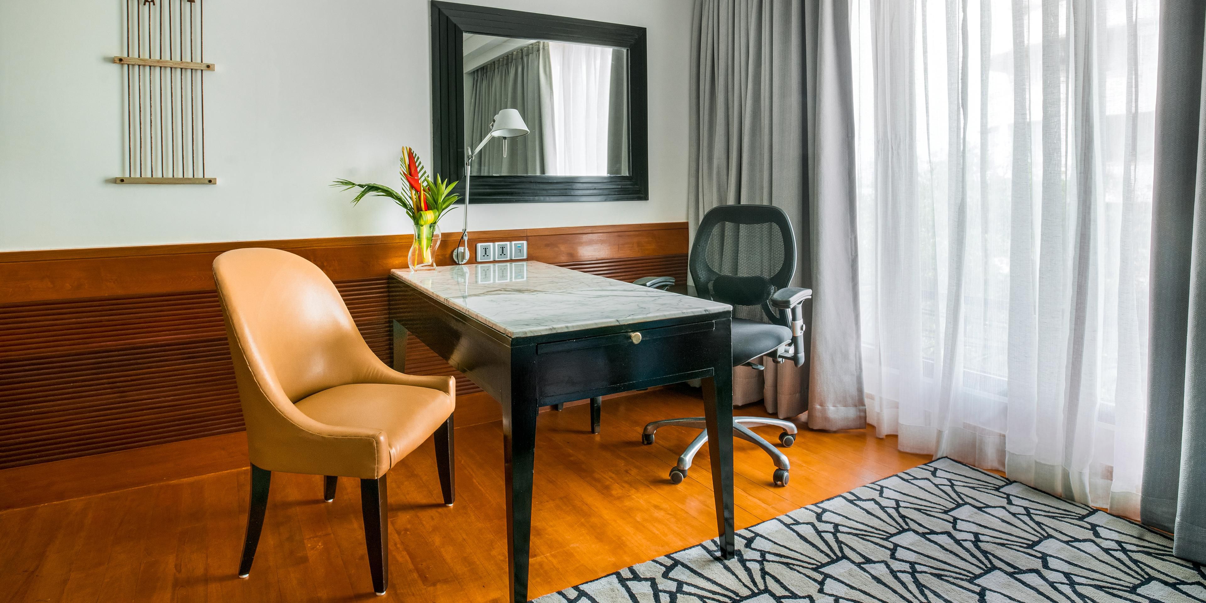Guest room features a work space