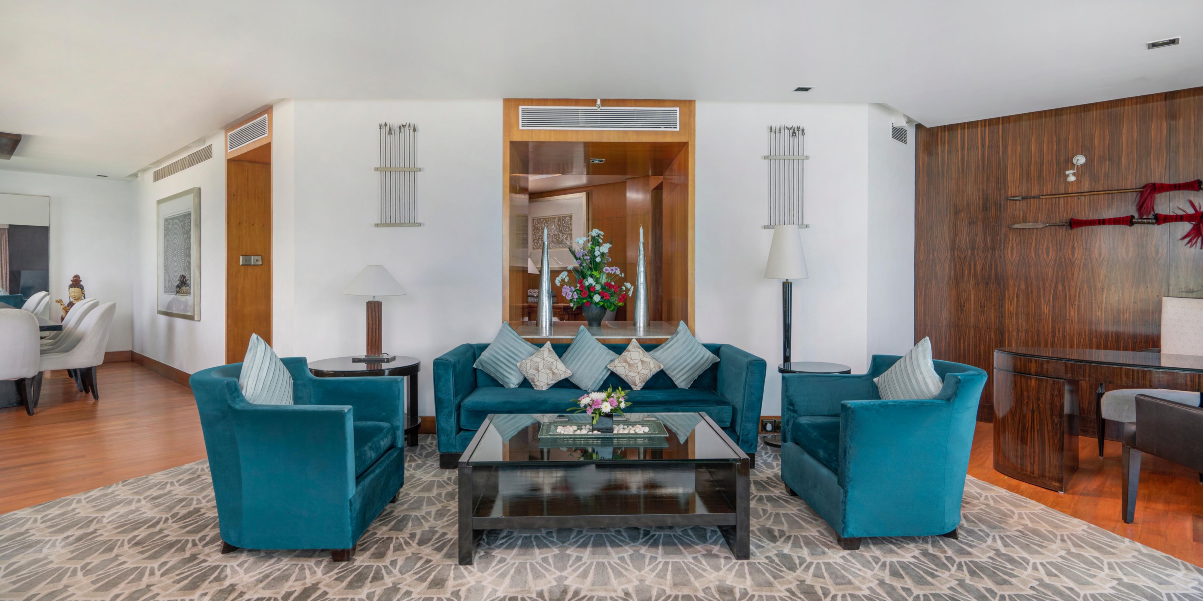 Luxury suite features a living room, dining room and work space
