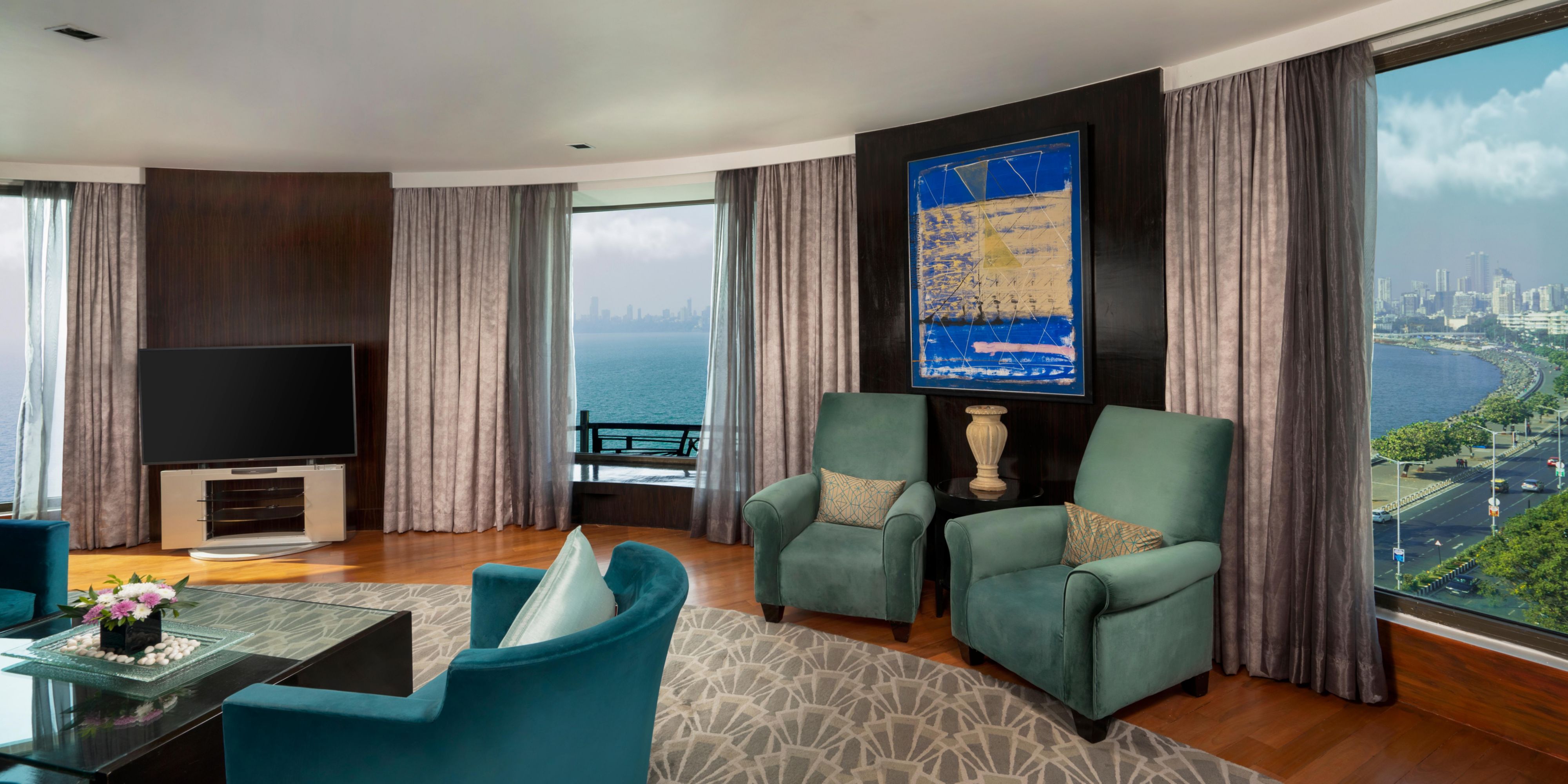 Enjoy unparalleled views of Mumbai's skyline from the living room