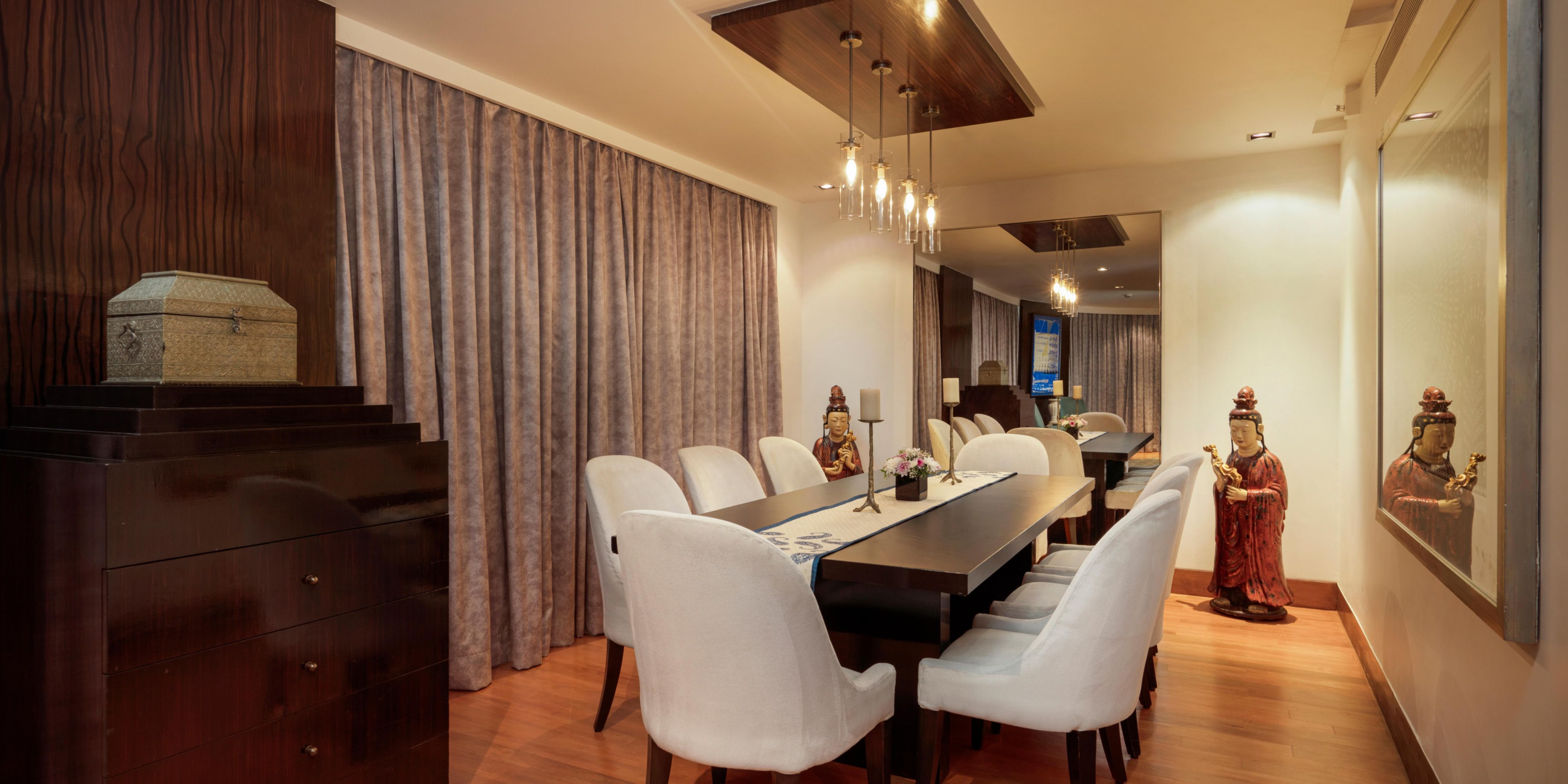 Luxury suite features a dining room fit for a celebration