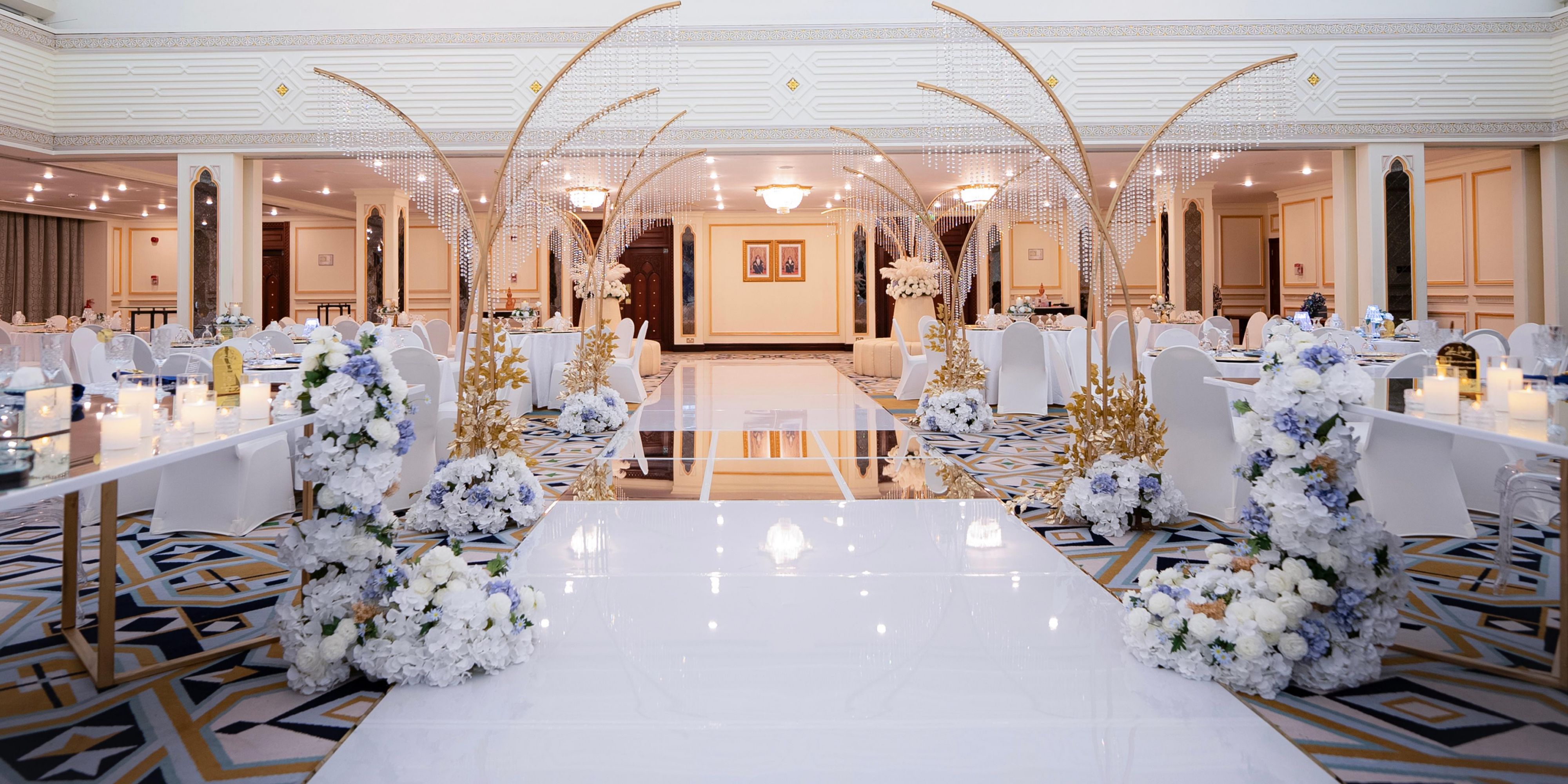 Host your dream wedding at the elegant Jabrin Ballroom, designed to create unforgettable memories of your big day. From personalised décor to expert event planning, every detail is crafted to perfection. Celebrate in style with stunning floral arrangements and lavish suite rooms, creating an extraordinary experience for you and your guests.