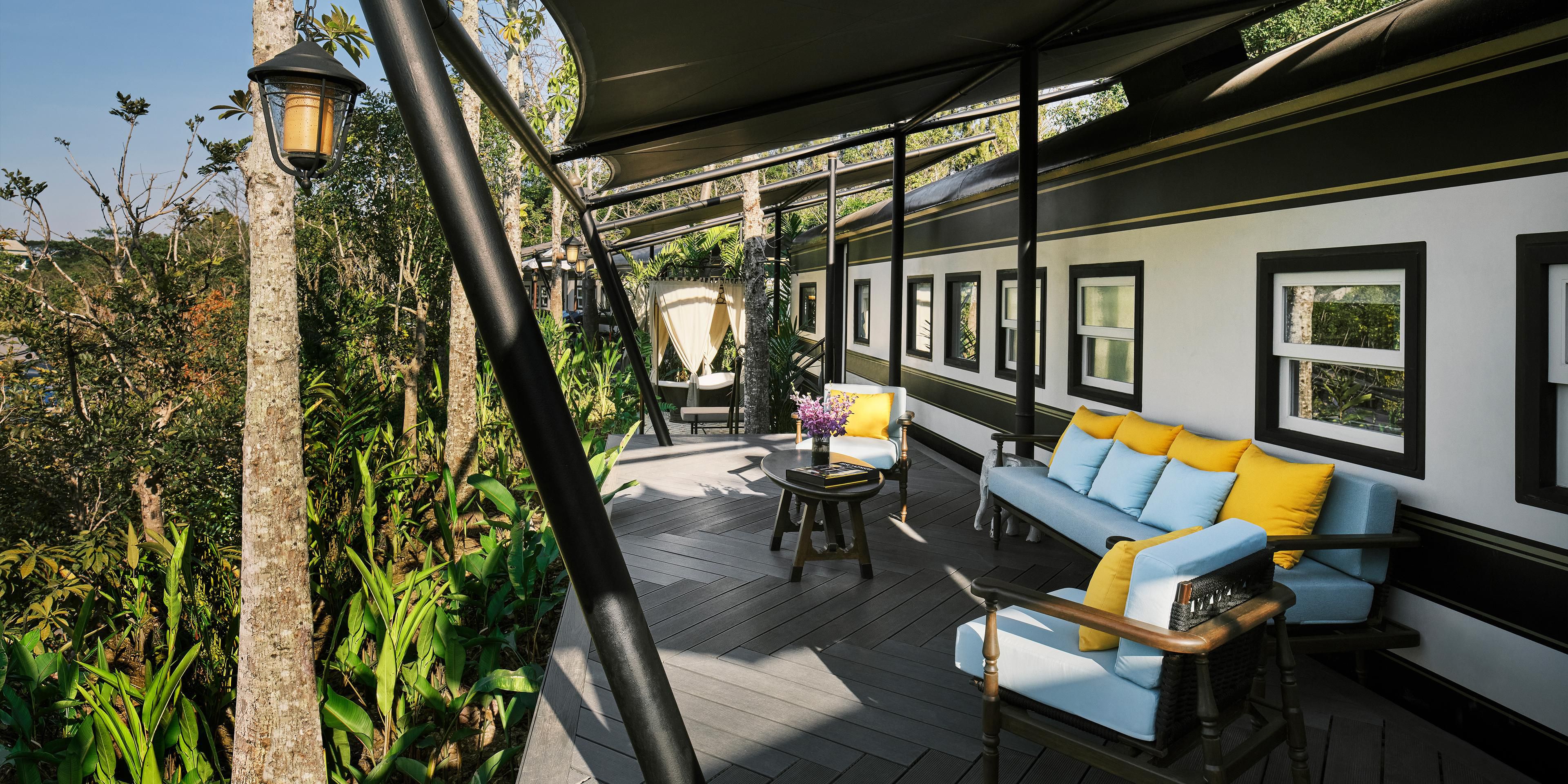 An outdoor balcony and bathtub of Heritage Railcar 2Bedroom 