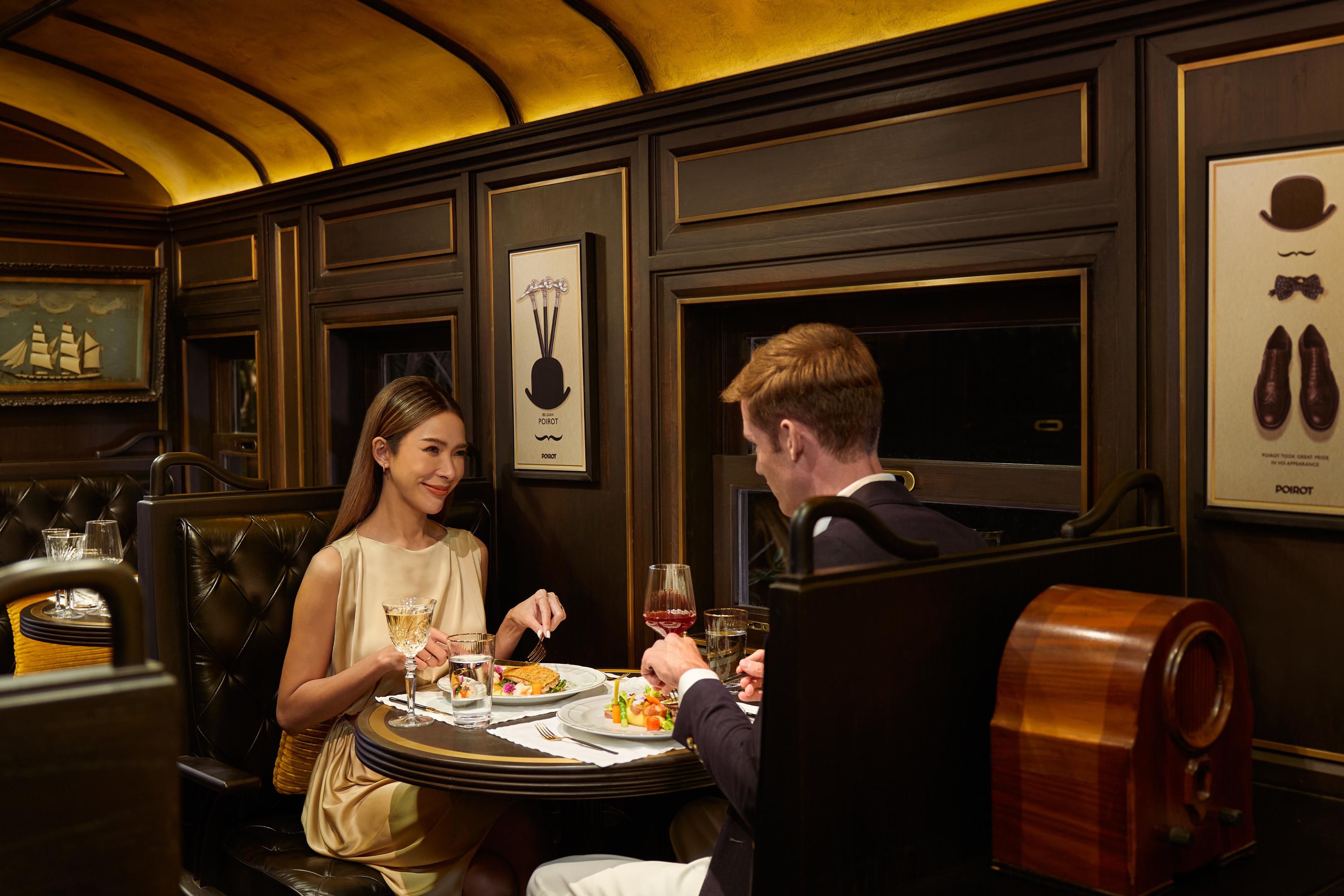 Enjoy an exquisite dining journey on a train carriage at Poirot
