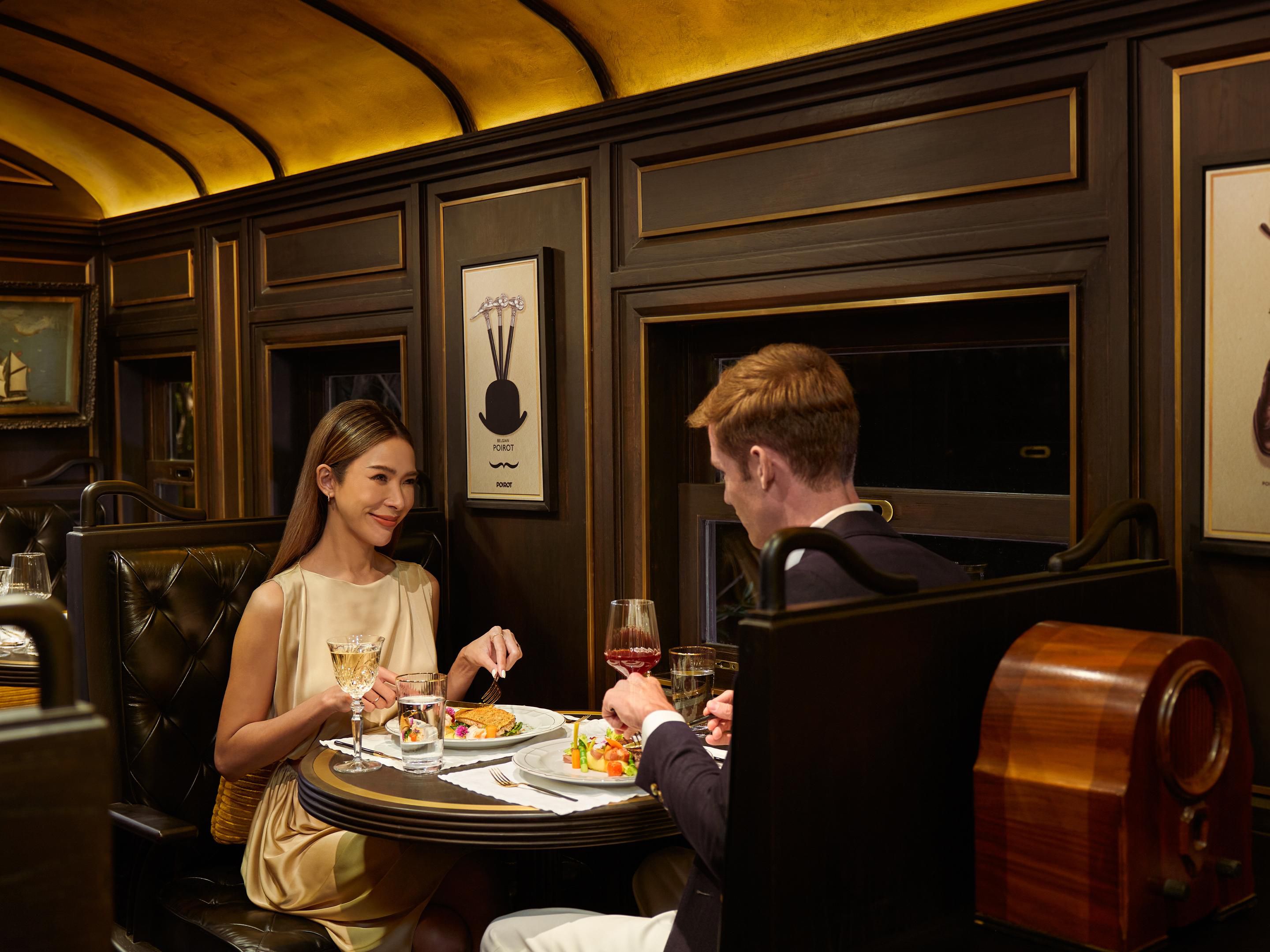 Enjoy an exquisite dining journey on a train carriage at Poirot
