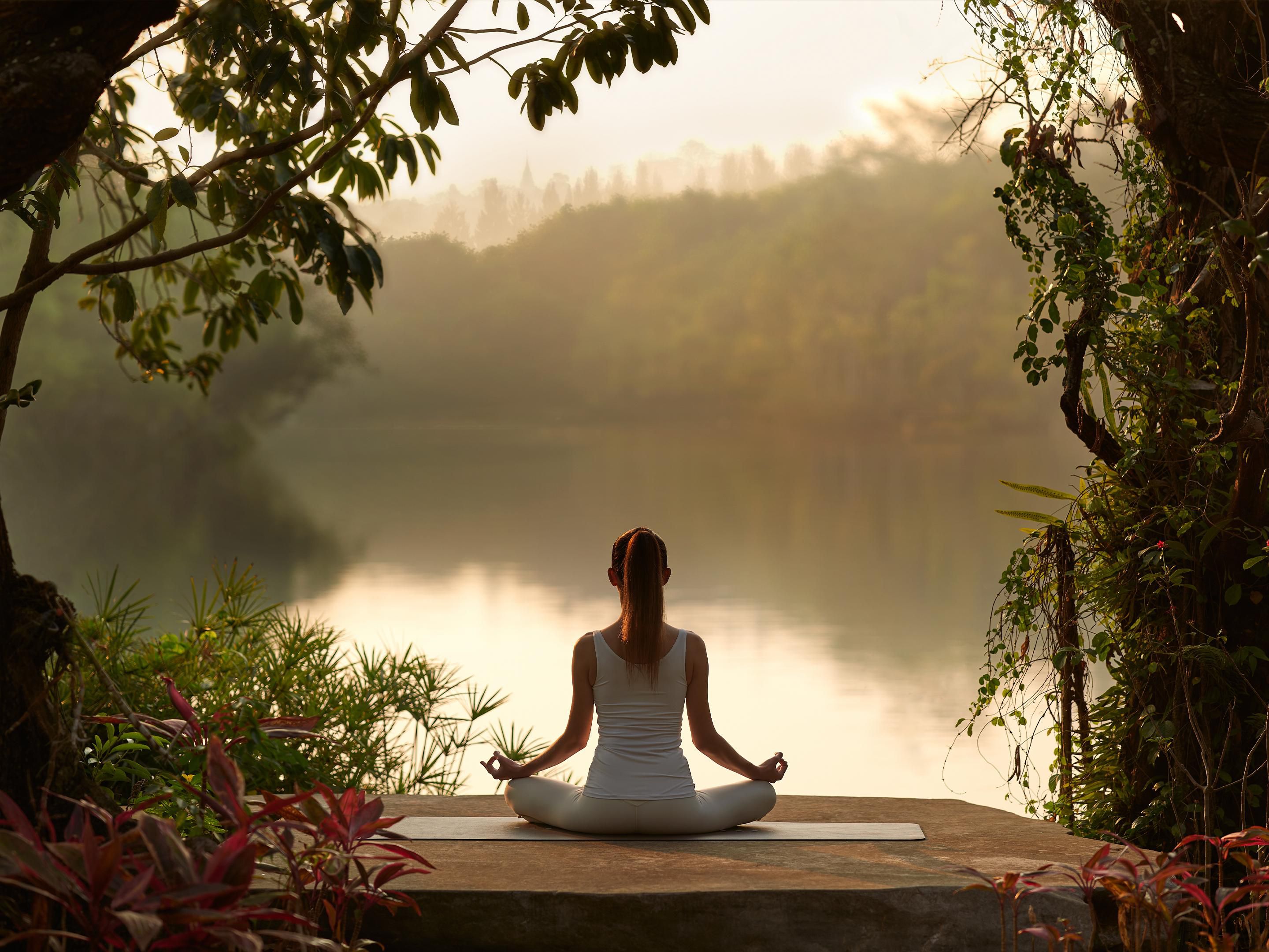 Enjoy the calm of a morning meditation session at Swan Lake lawn