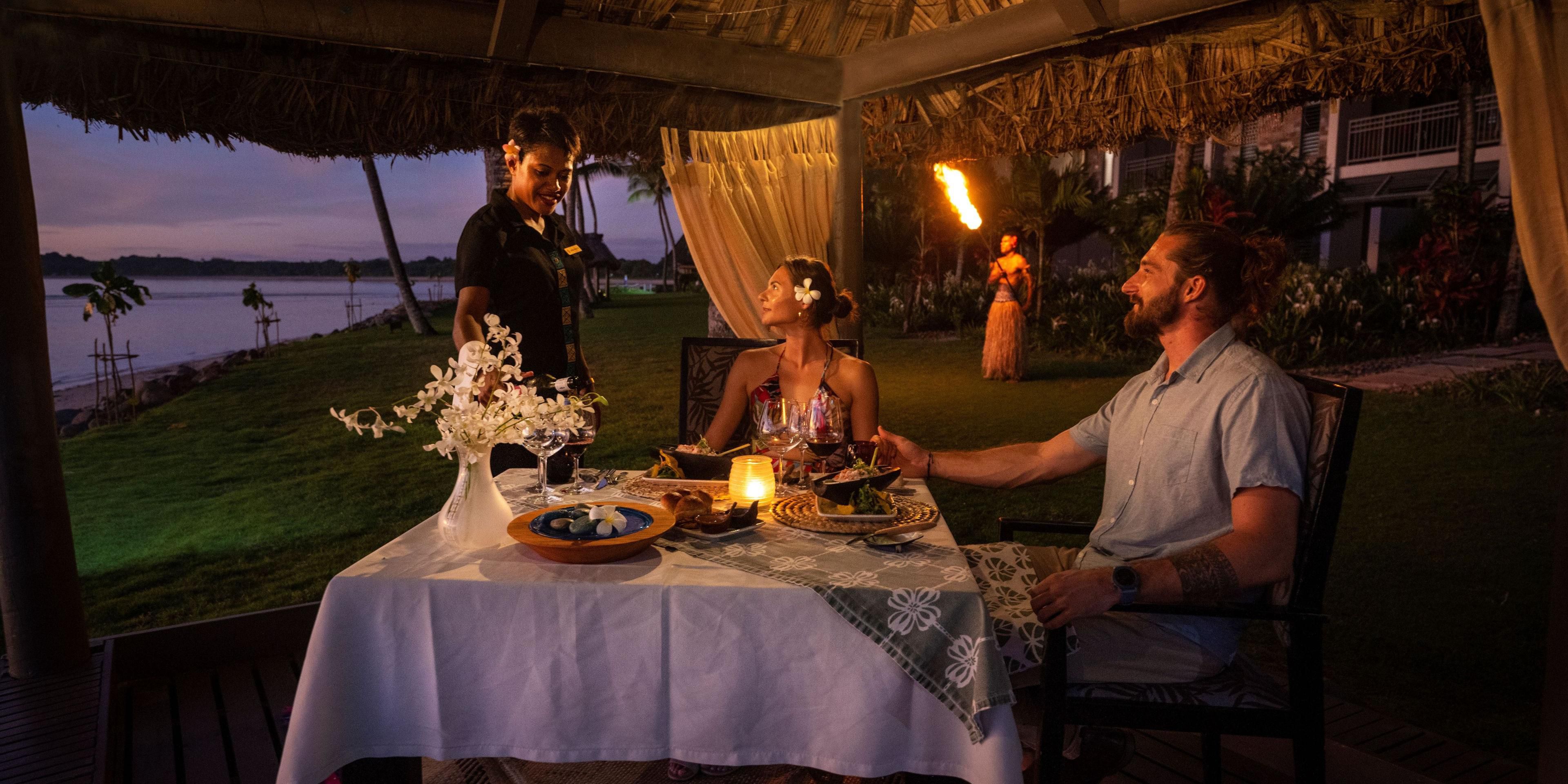 Celebrate the spirit of romance and experience the luxury of dining in a private cabana, set against an ocean backdrop. Indulge with a lavish "Seafood Sensation" menu or an indulgent set menu with wine, served as the warm sea breeze and gentle waves set the mood for a romantic evening.