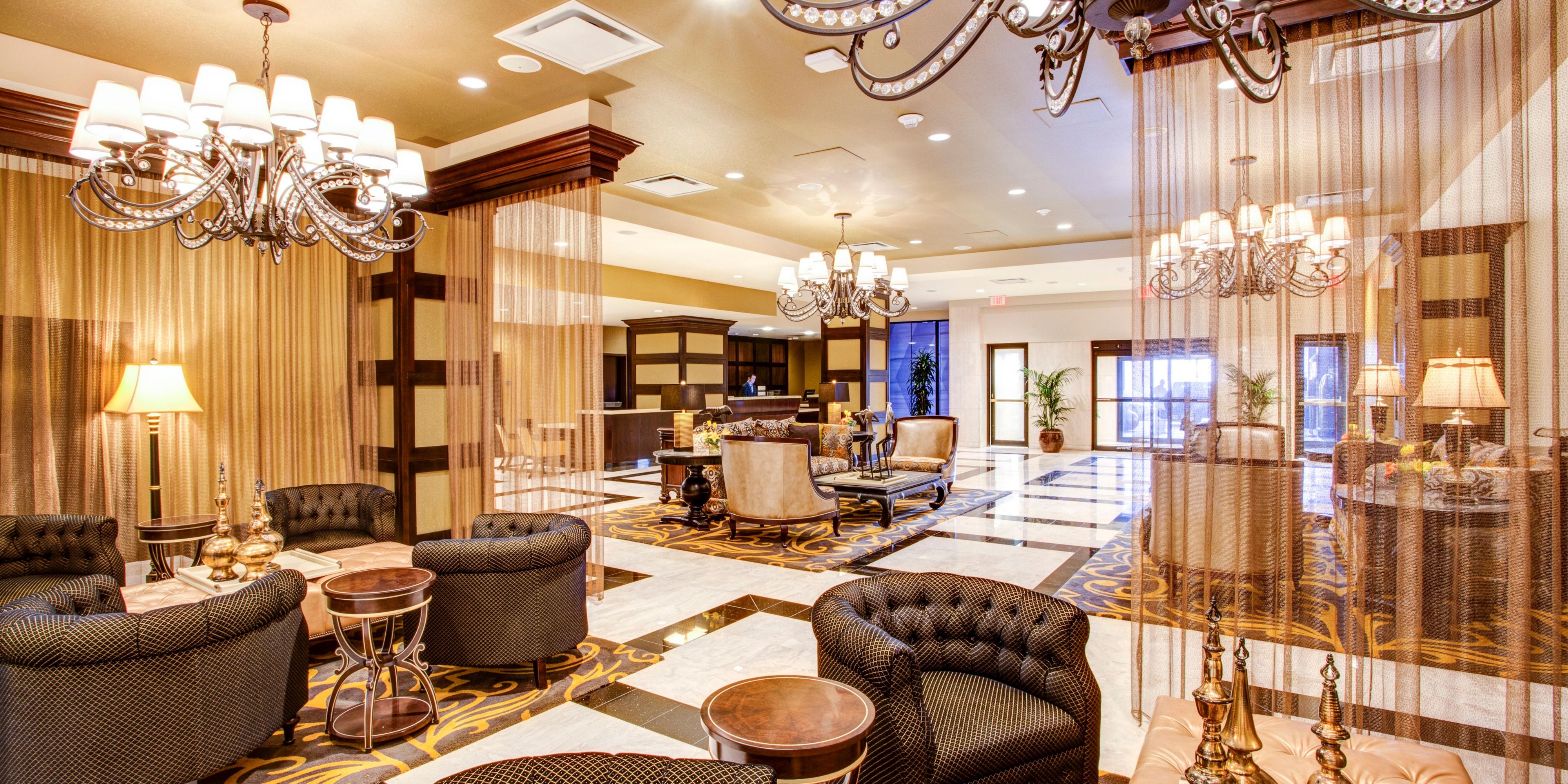 Expansive lobby of the InterContinental New Orleans luxury hotel