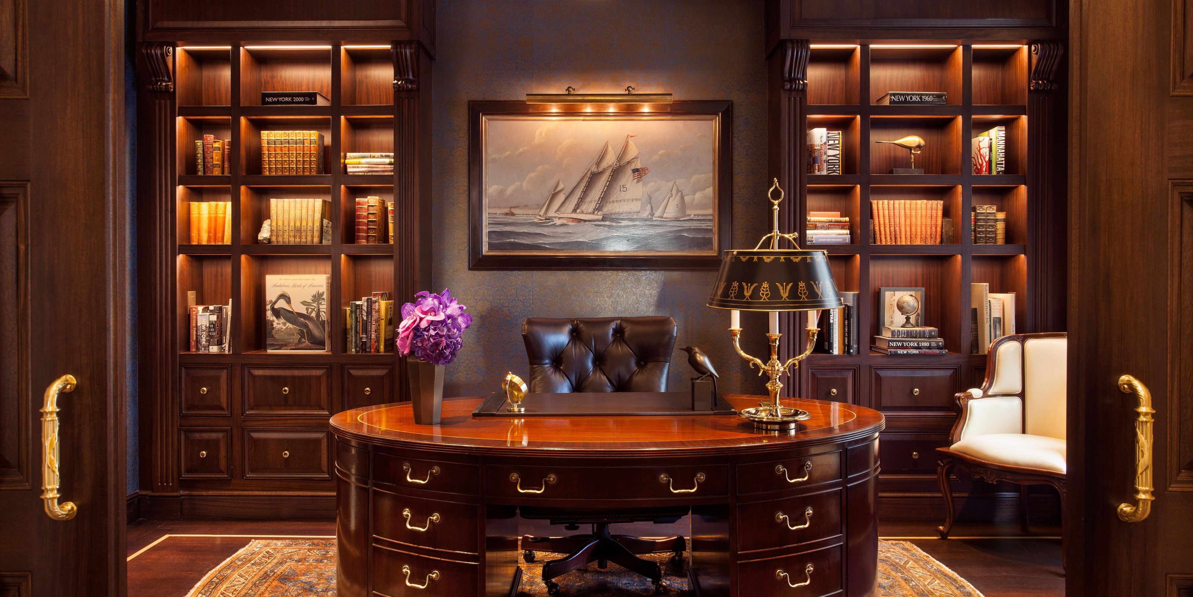 Extra workspace desk and library in our Presidential Suite.