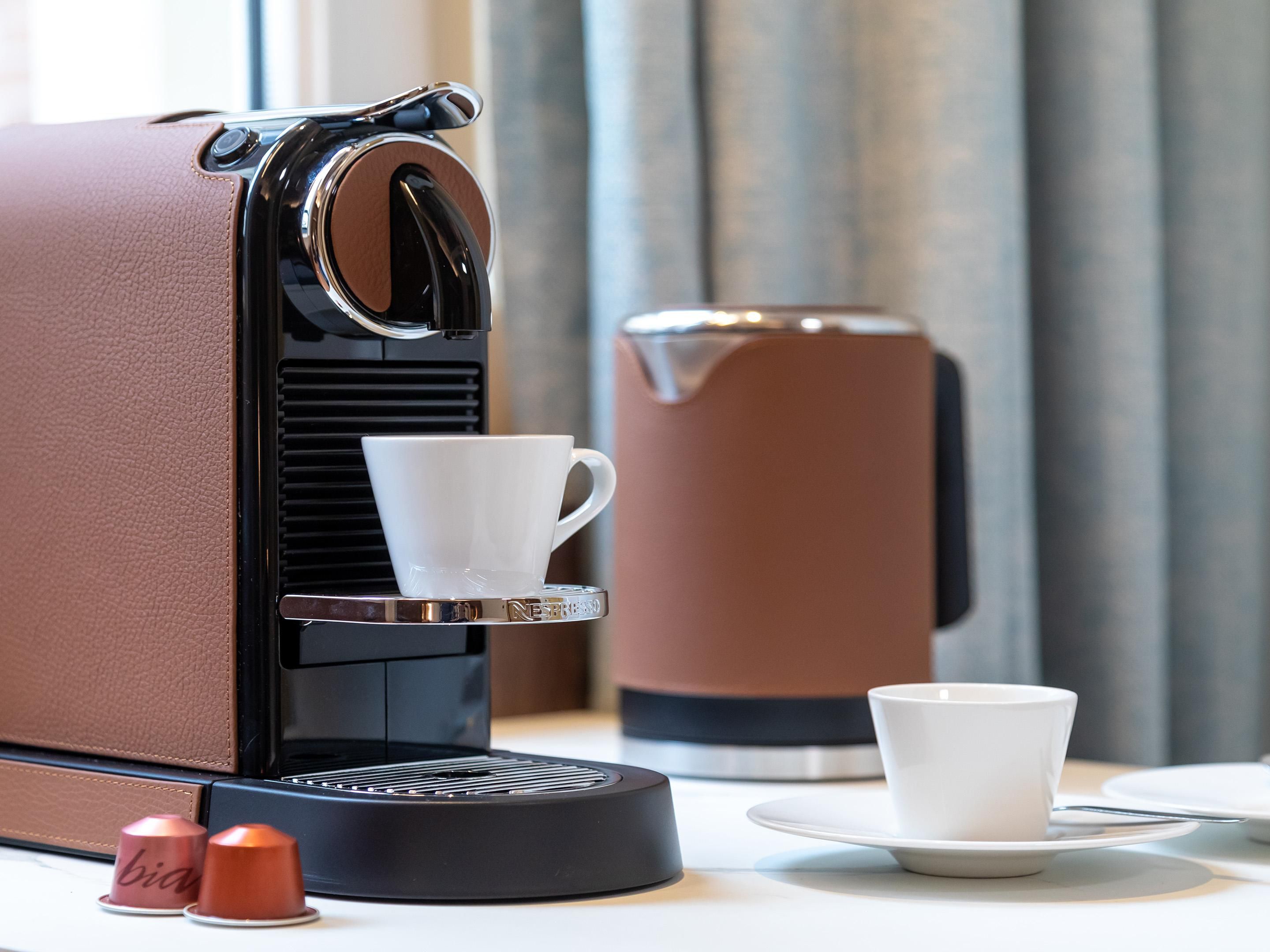 Sip a Nespresso coffee in-room poured from our leathered machines.