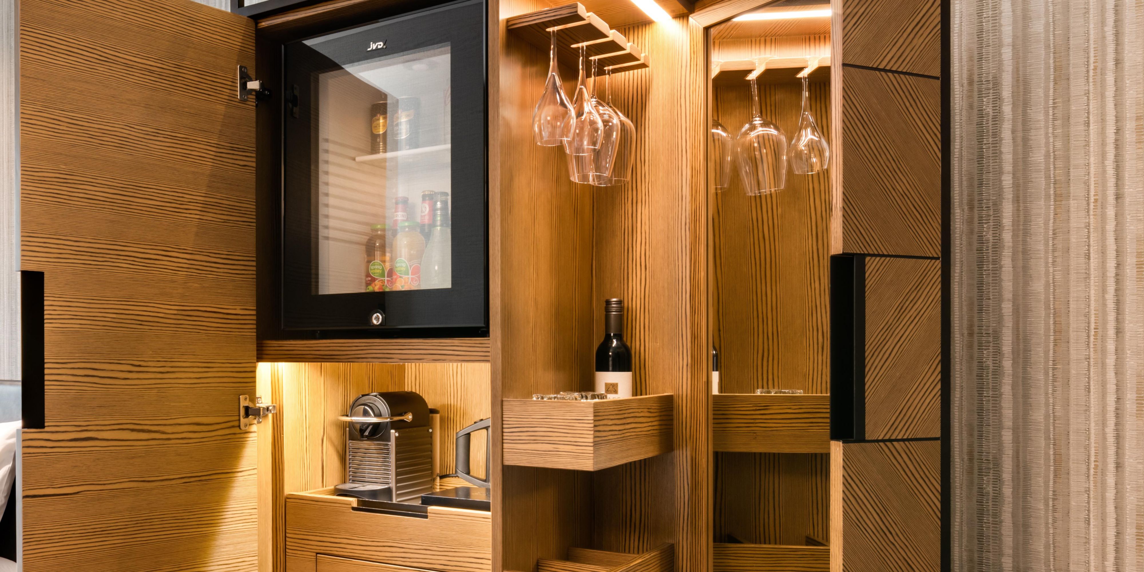 Fully catered mini bar in room with fridge wine tea and coffee