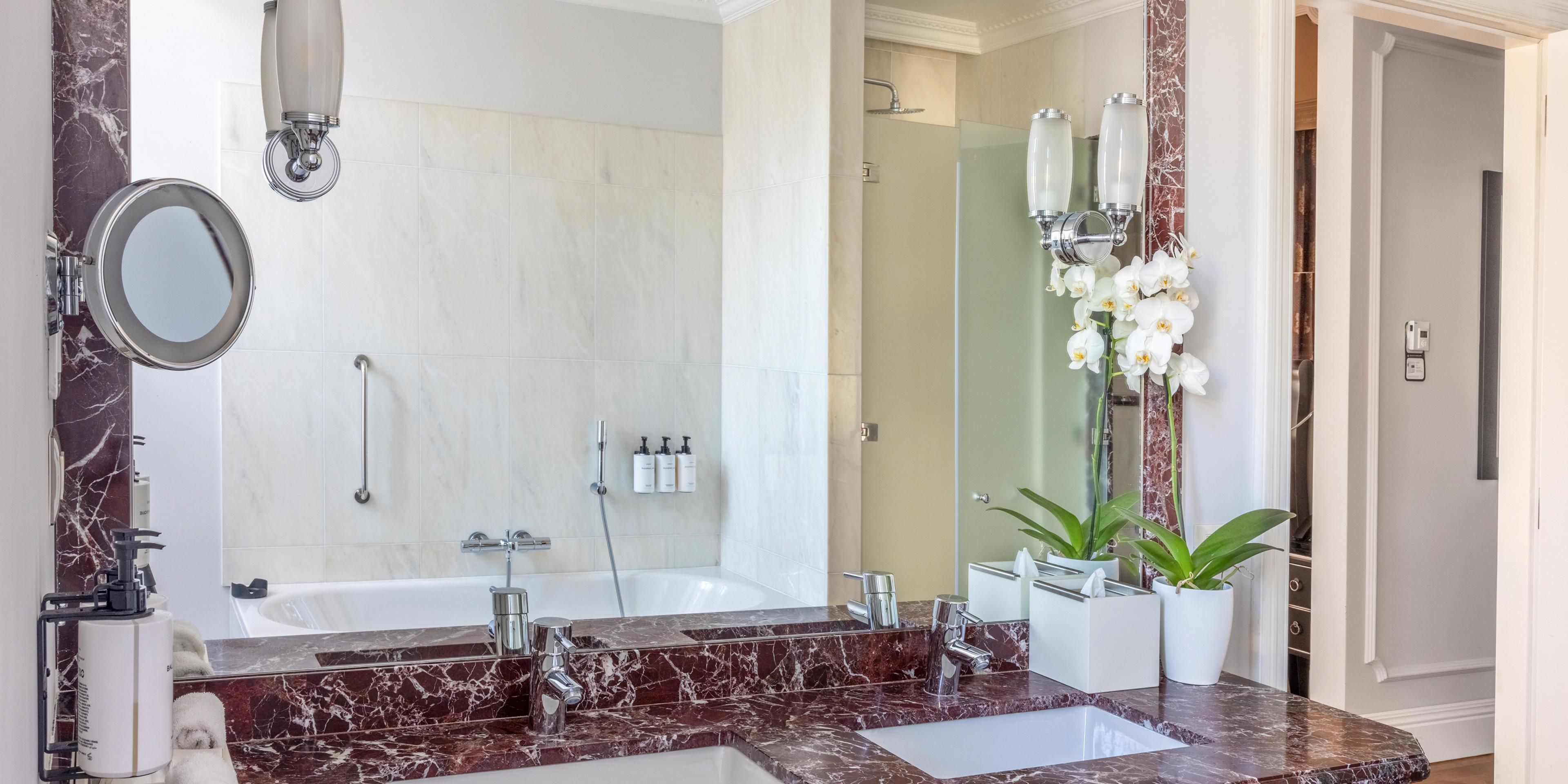 Elegant marble bathroom with bathtub