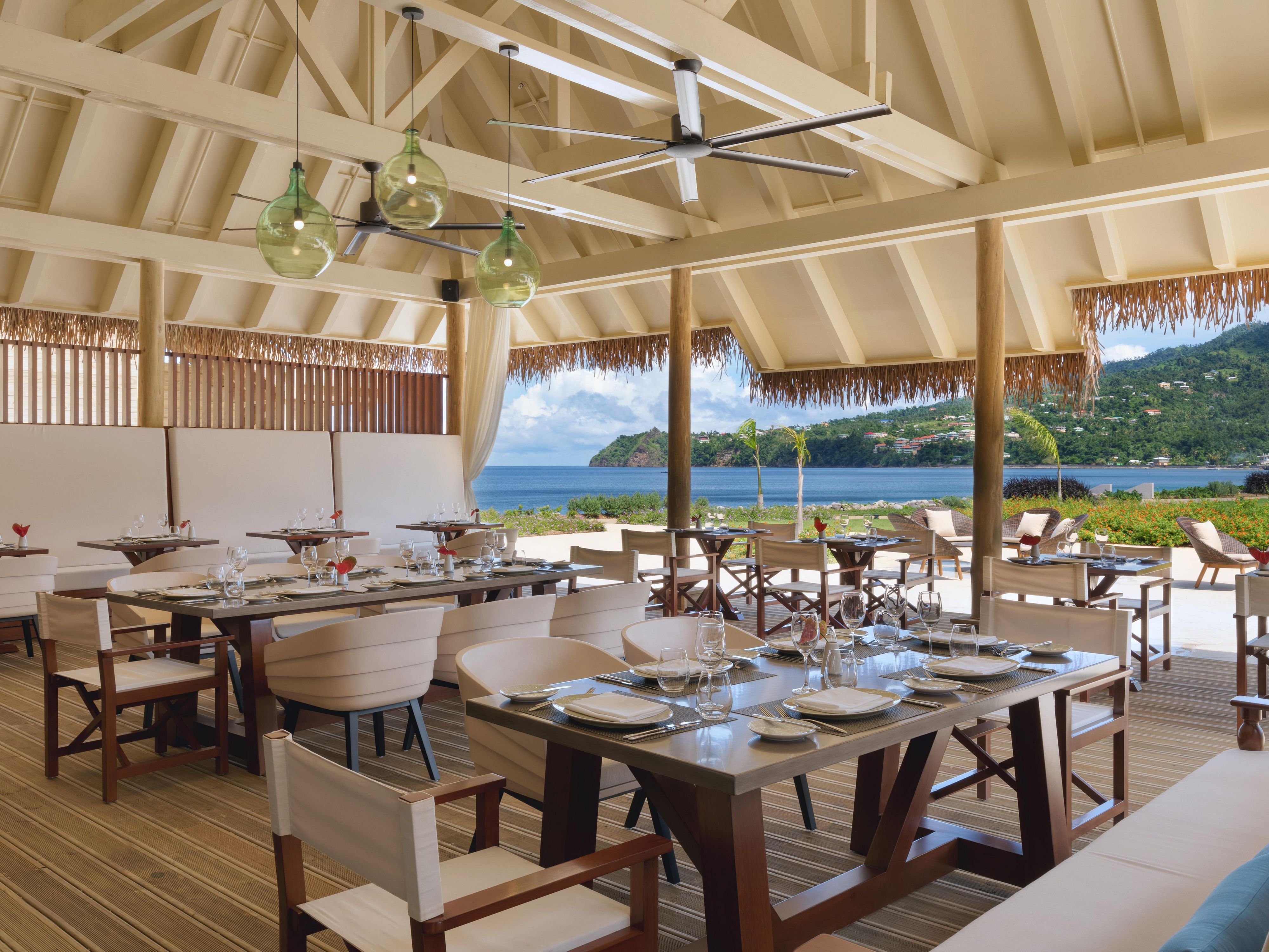 Relax in ocean breezes while you dine at Kwéyòl Beach Café.