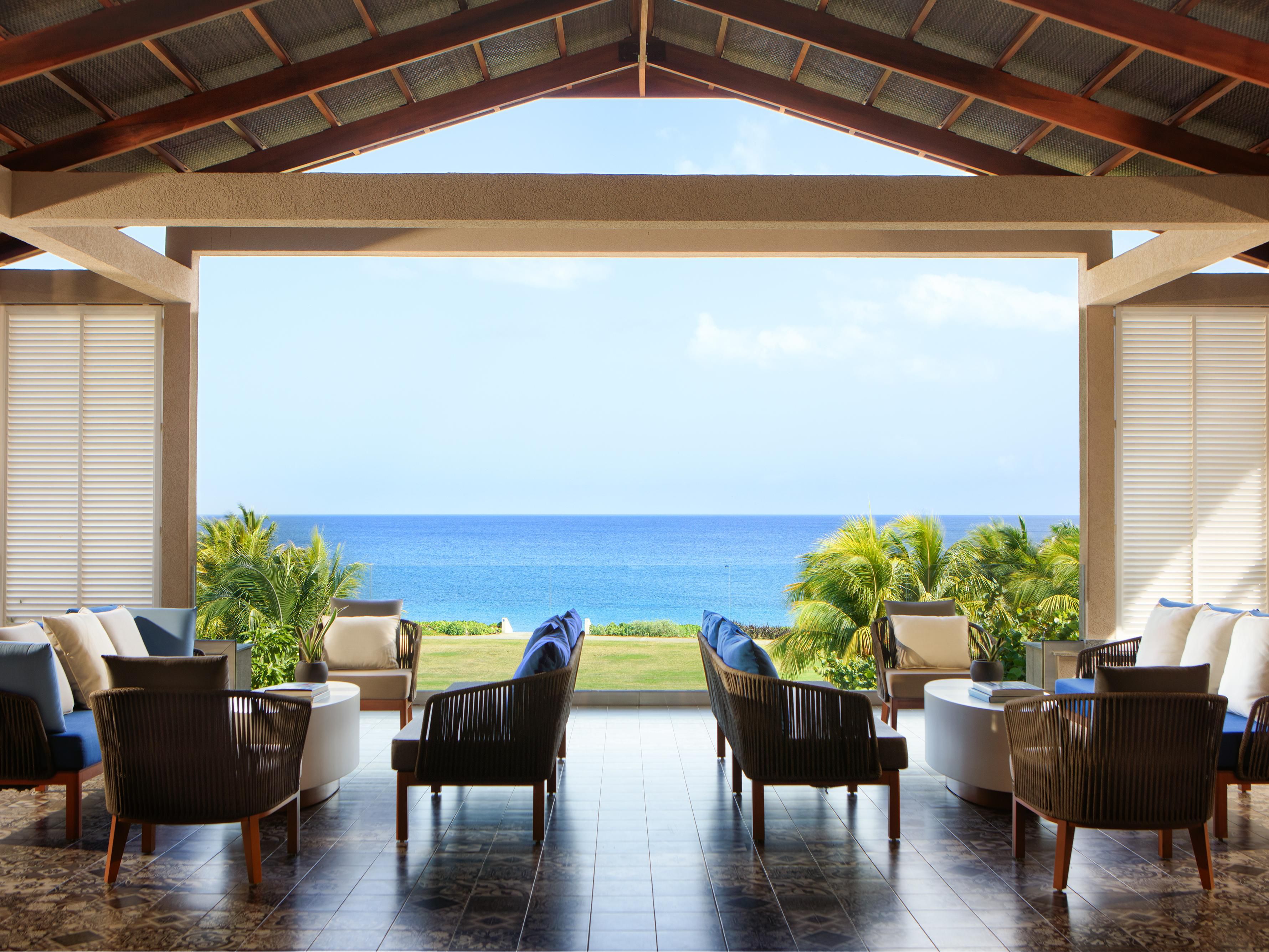 Experience the stunning open-air lobby with beautiful ocean views.