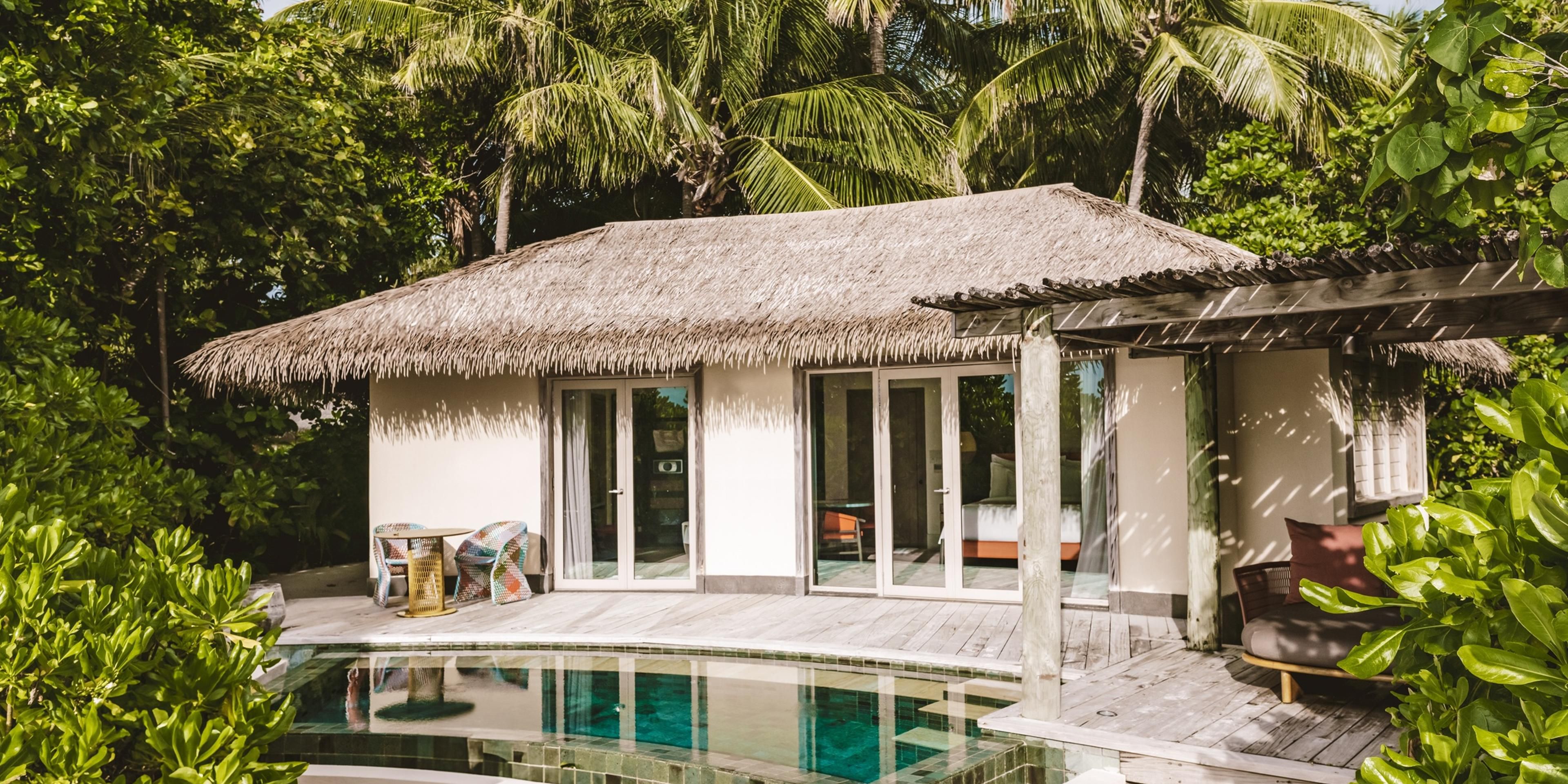 Three Berdoom Royal Beachfront Residence External Bedroom