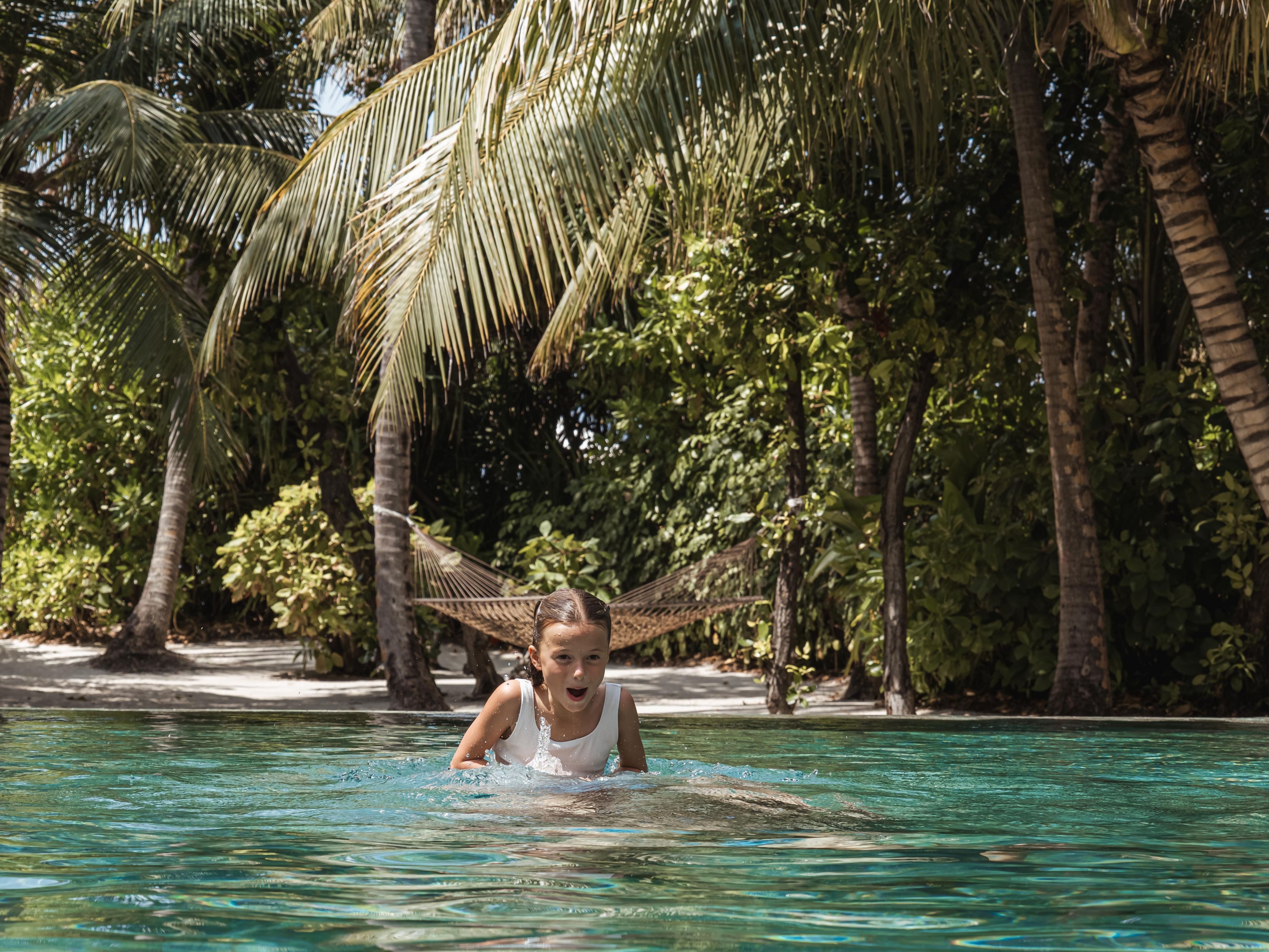 Children playing in the Three Bedroom Royal Beach Residence Pool