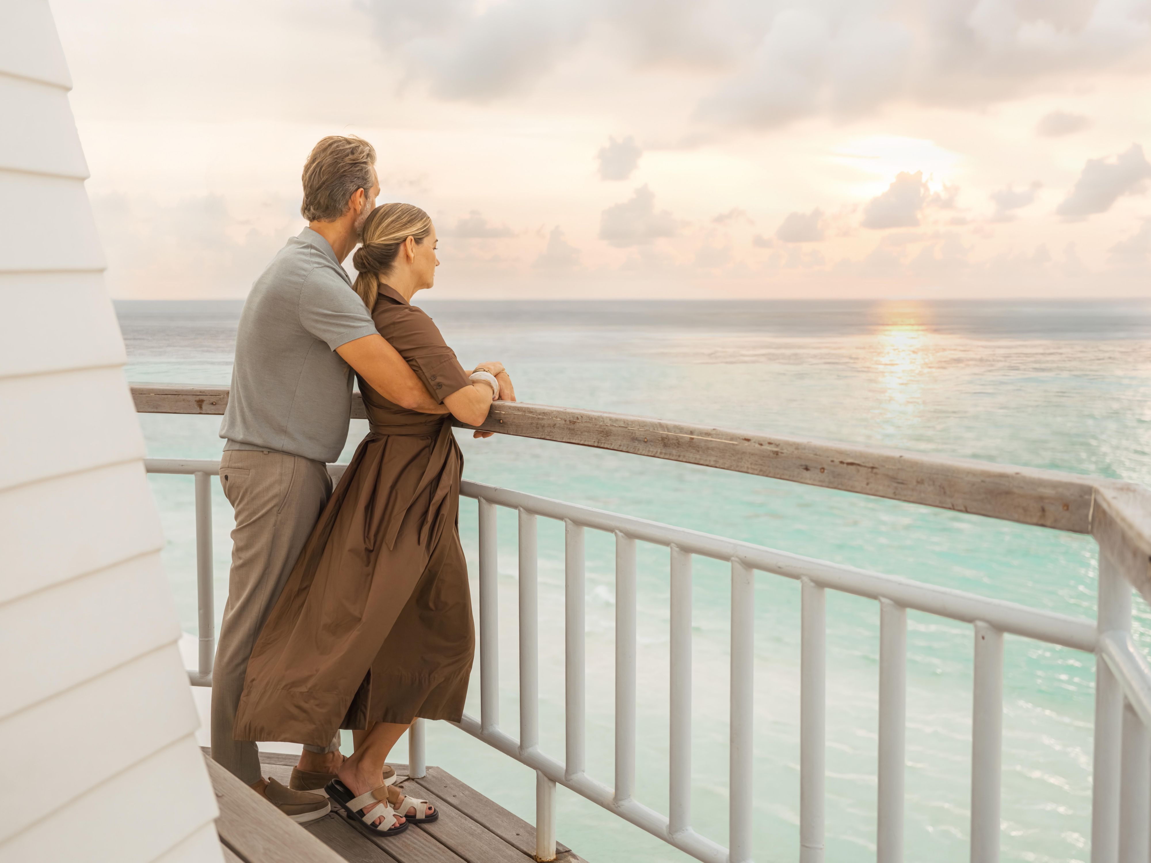 Guests Enjoying Sunset View at InterContinental Maldives