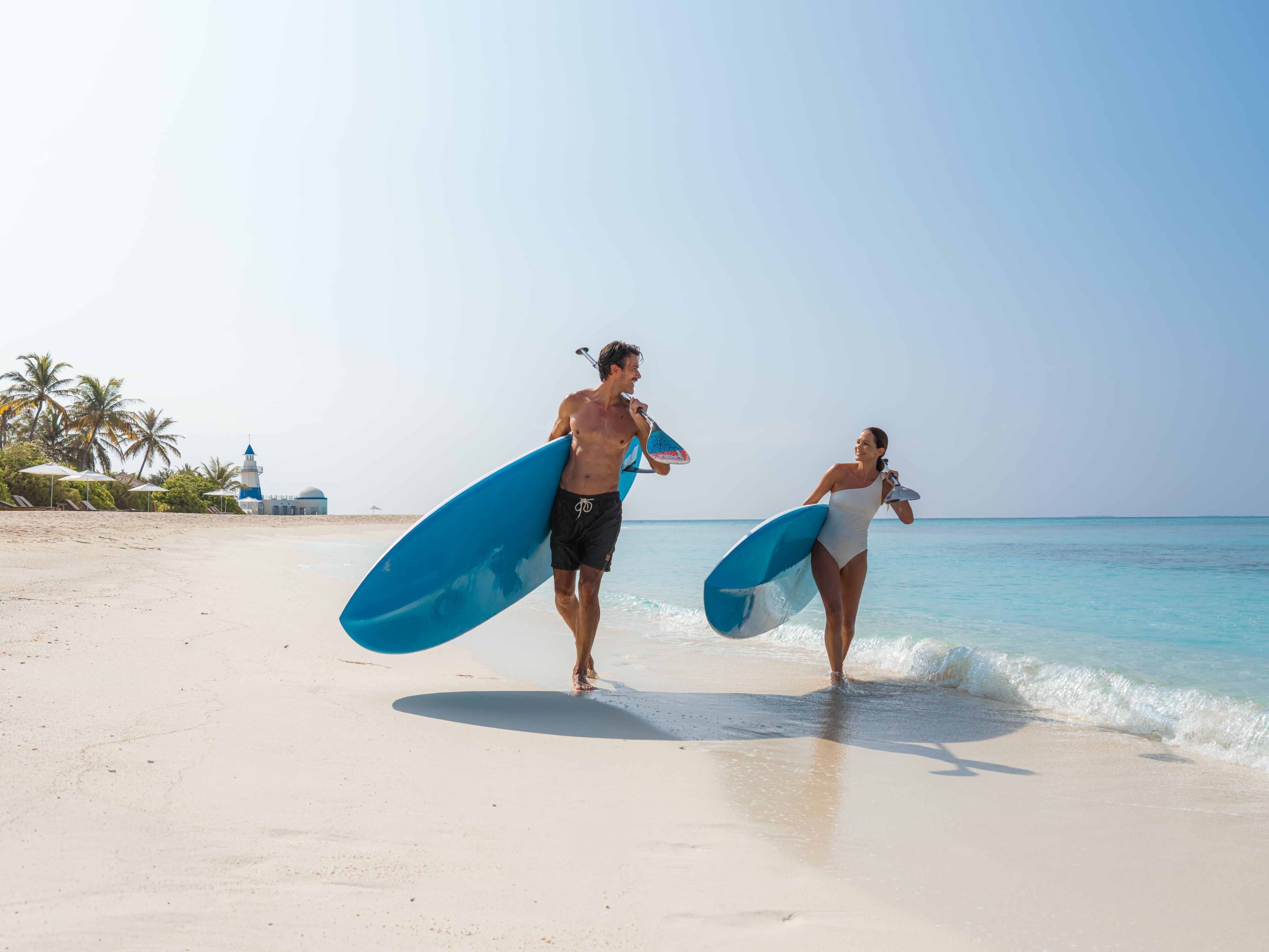Paddleboarding On Beach InterContinental Maldives