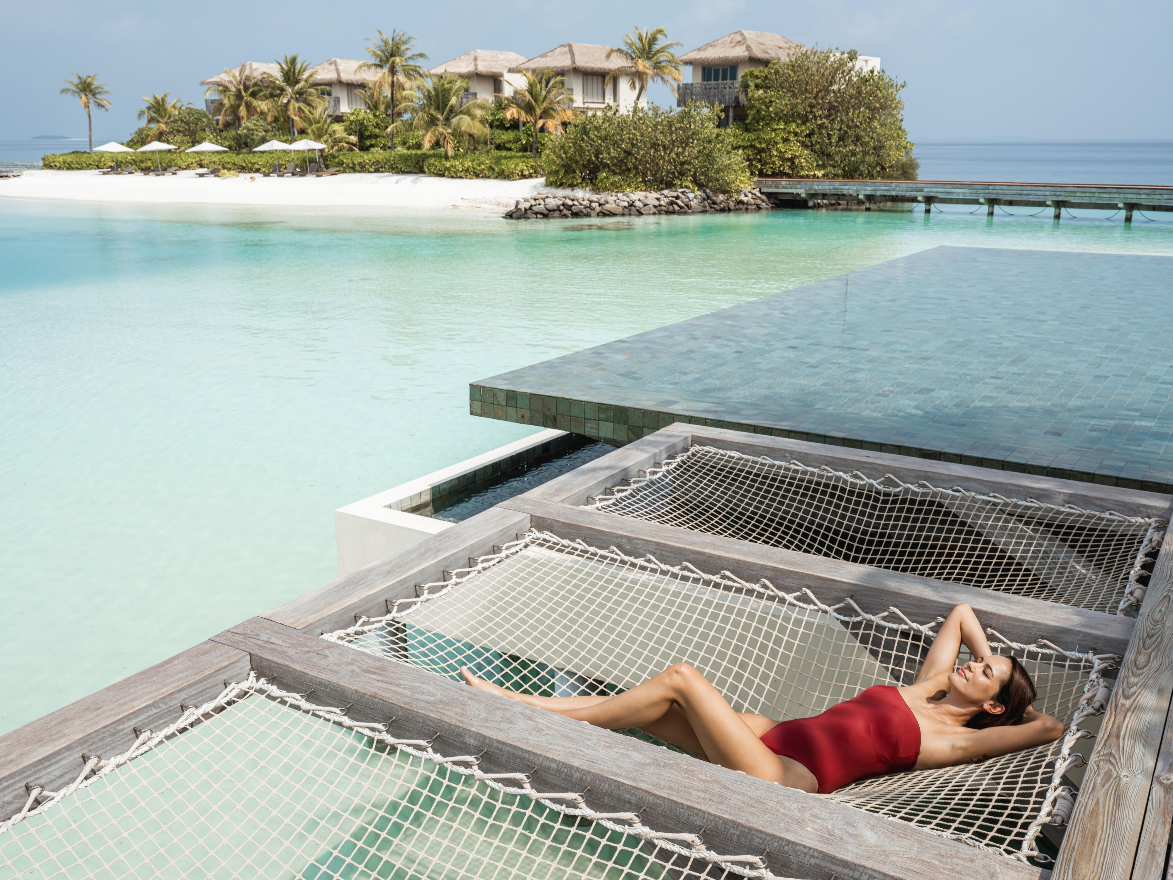 Overwater Hammock Sunbathing at InterContinental Maldives