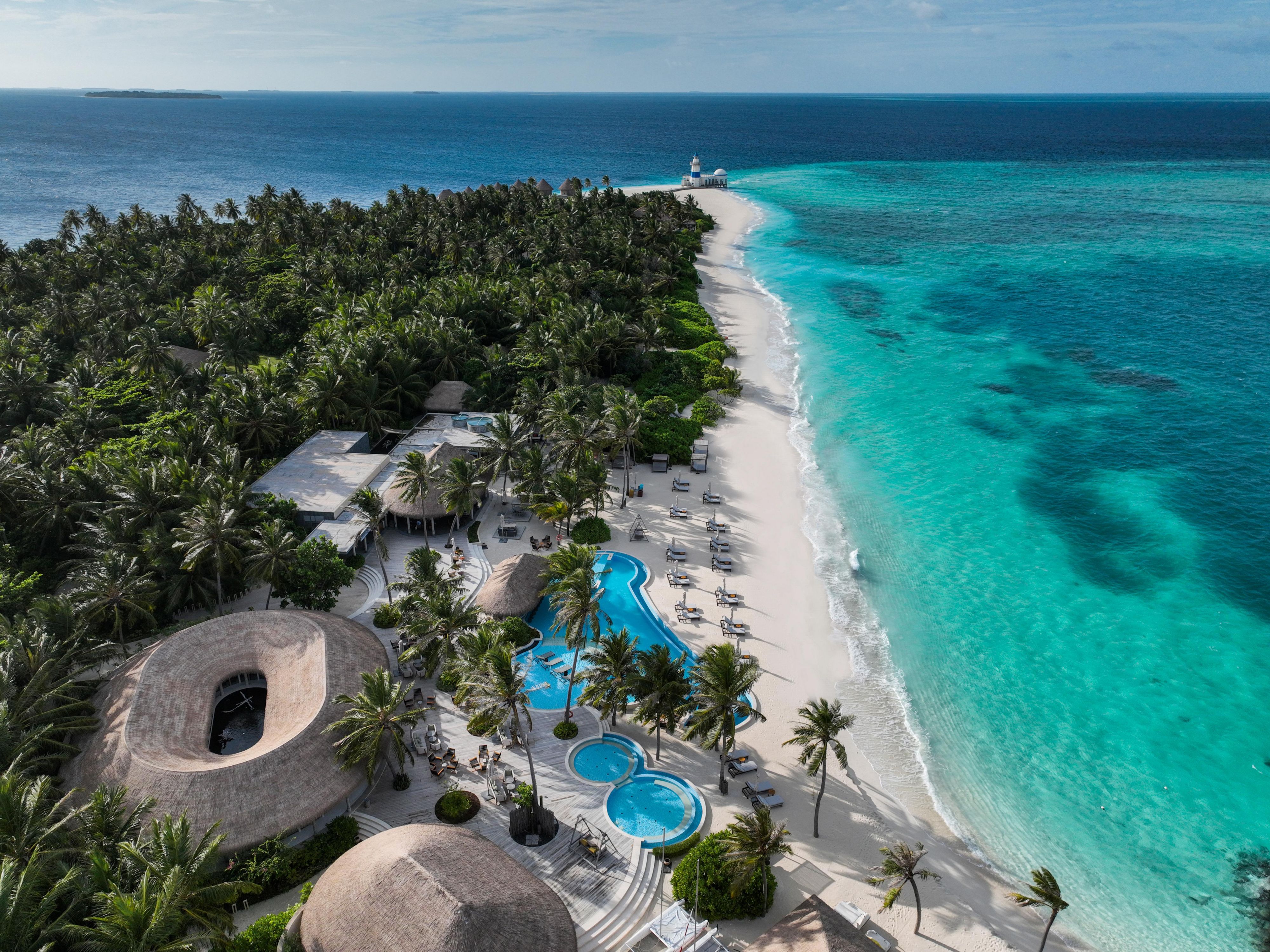 Inviting crystal-clear waters of the poolside