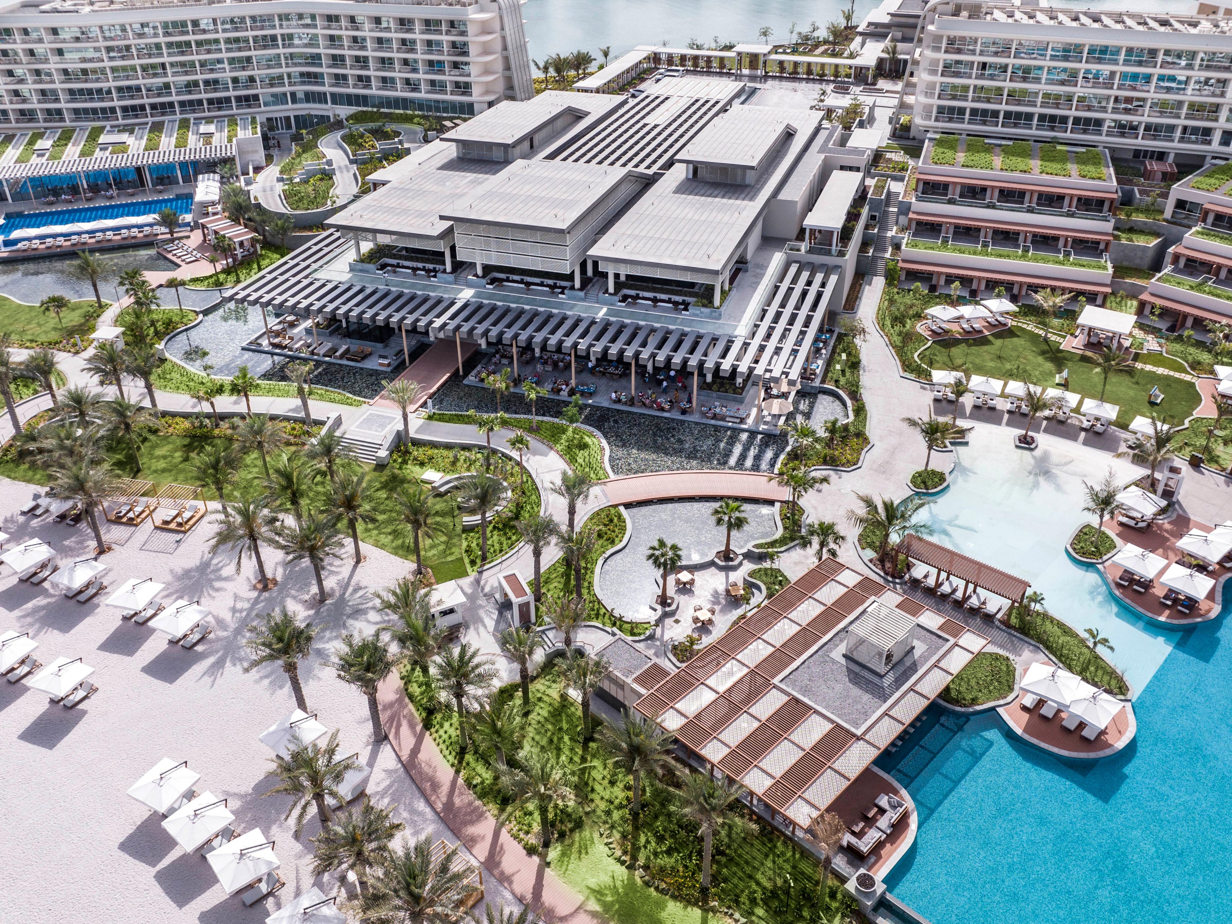 The water features flow through the staggered layout of the resort