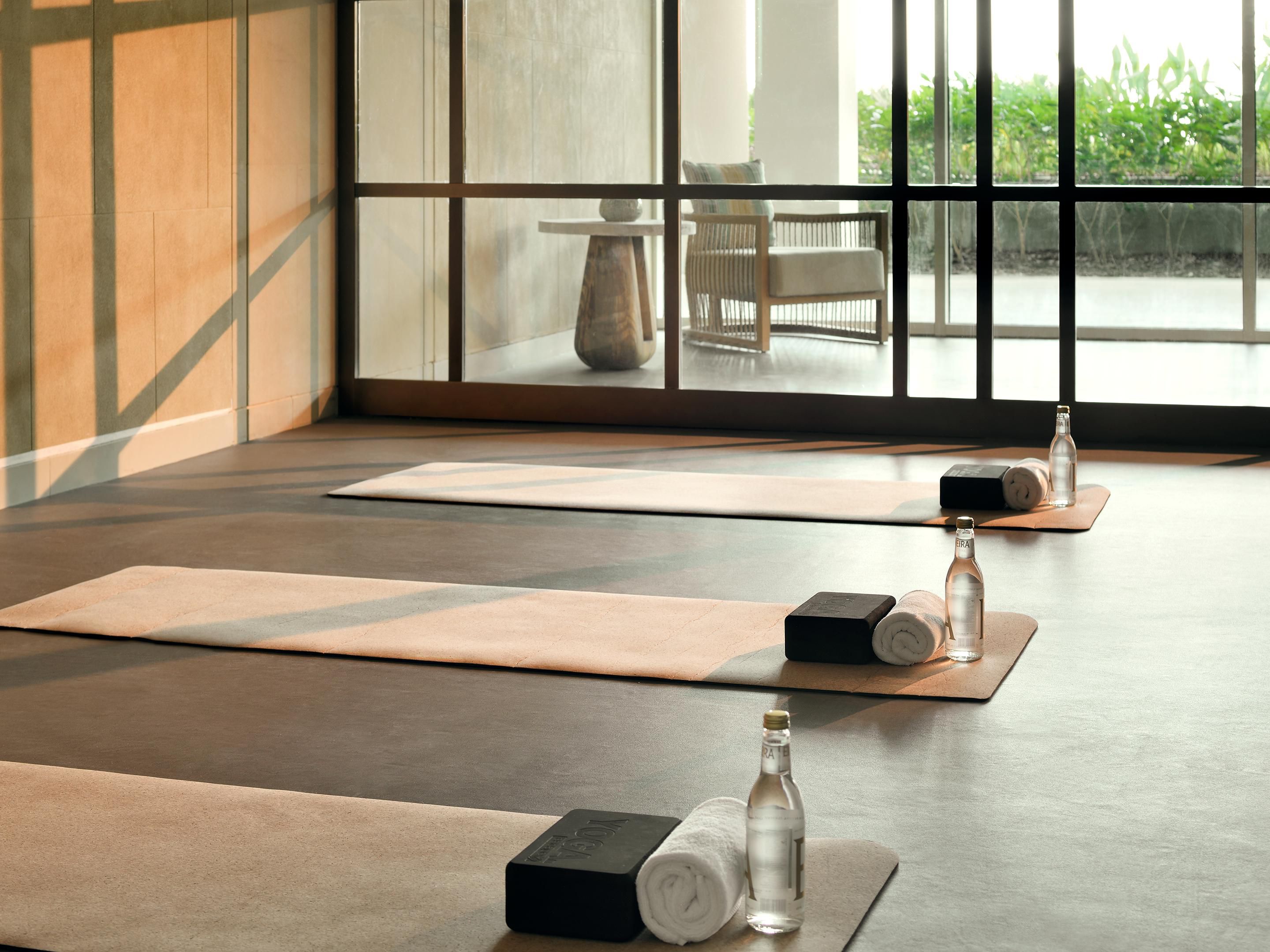 The natural light-flooded gym has a separate fitness studio