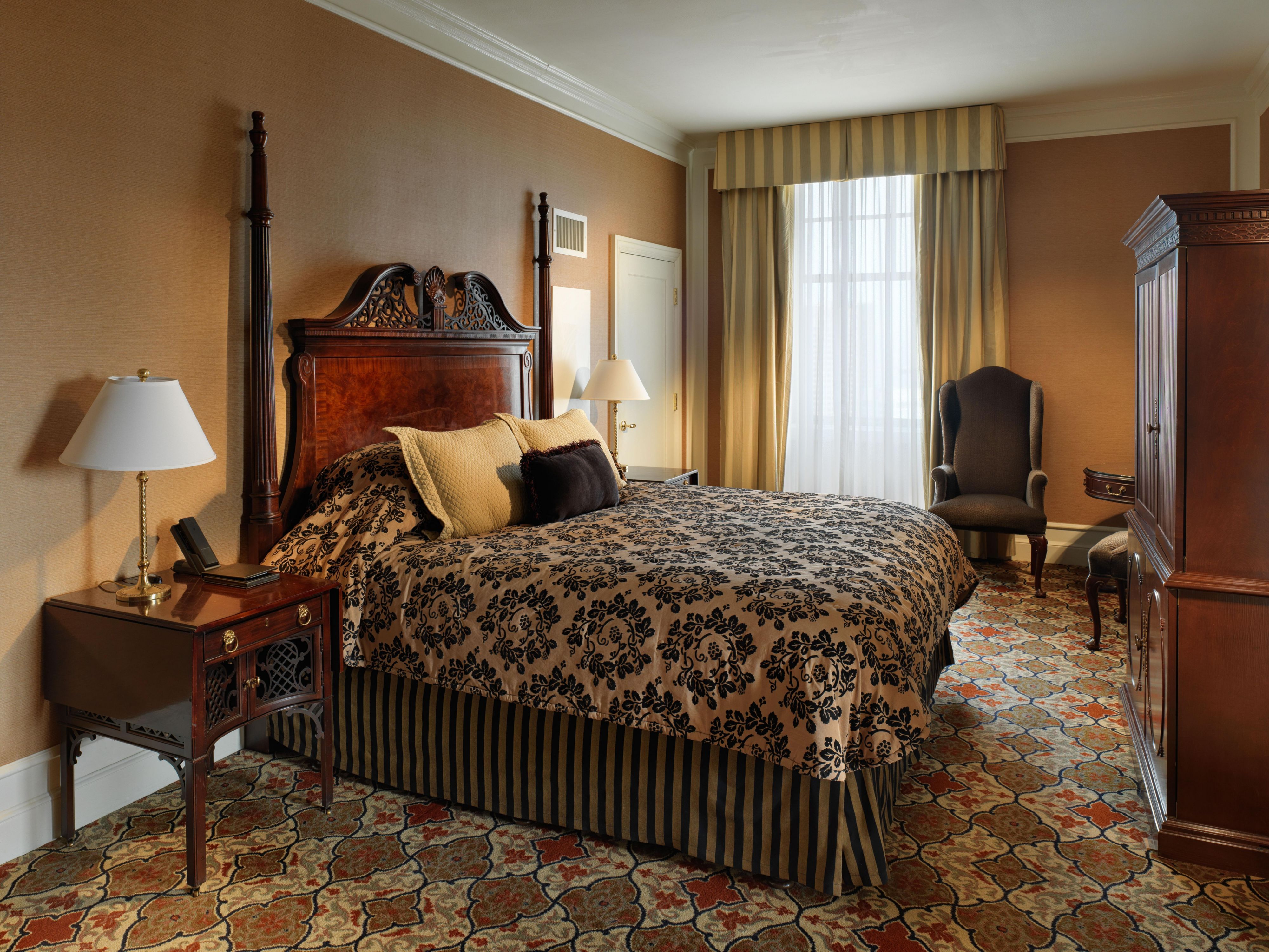 The stately Presidential Suite bedroom