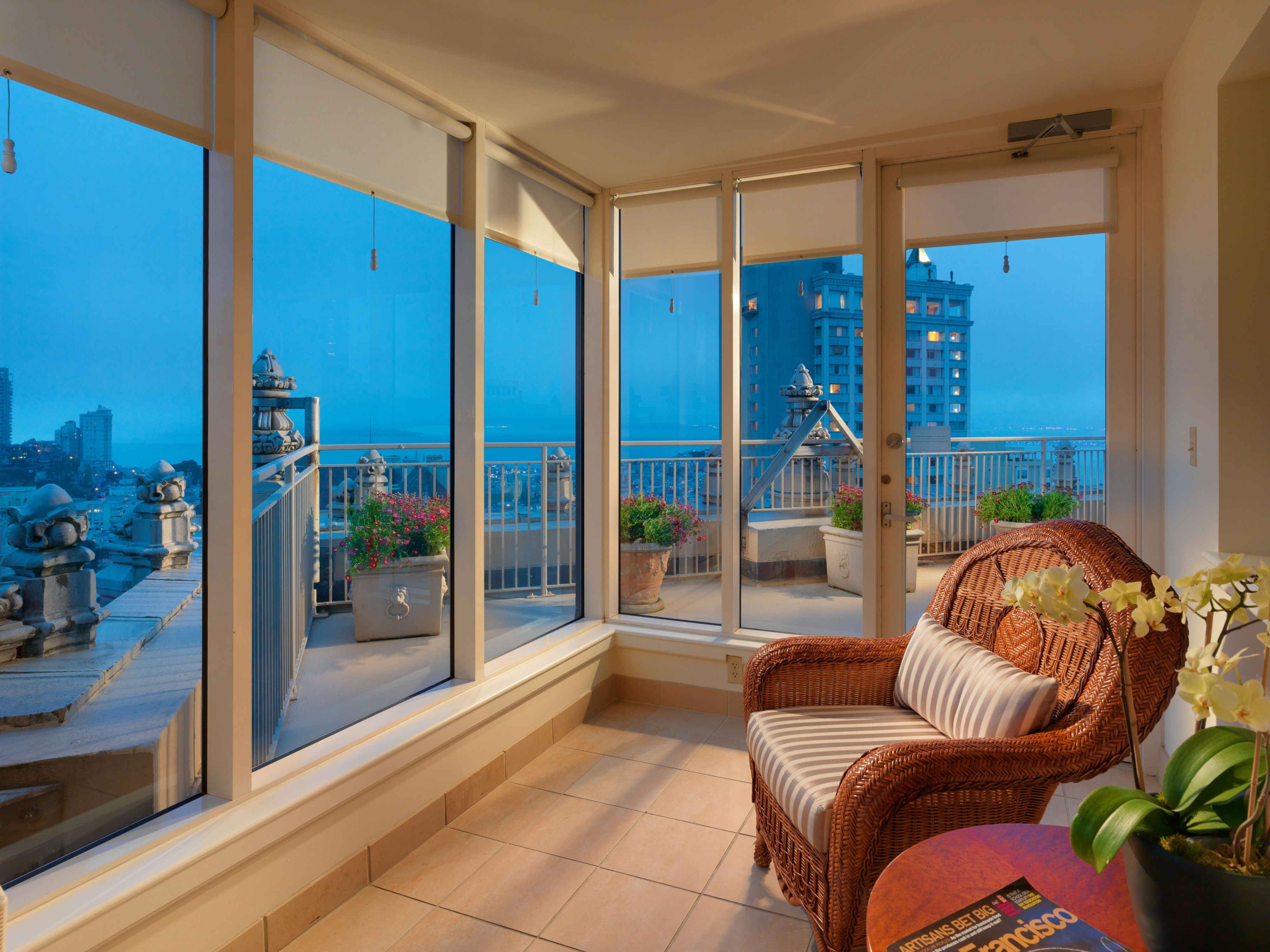 Sunroom and walk out terrace from the elegant Mark Hopkins Suite.