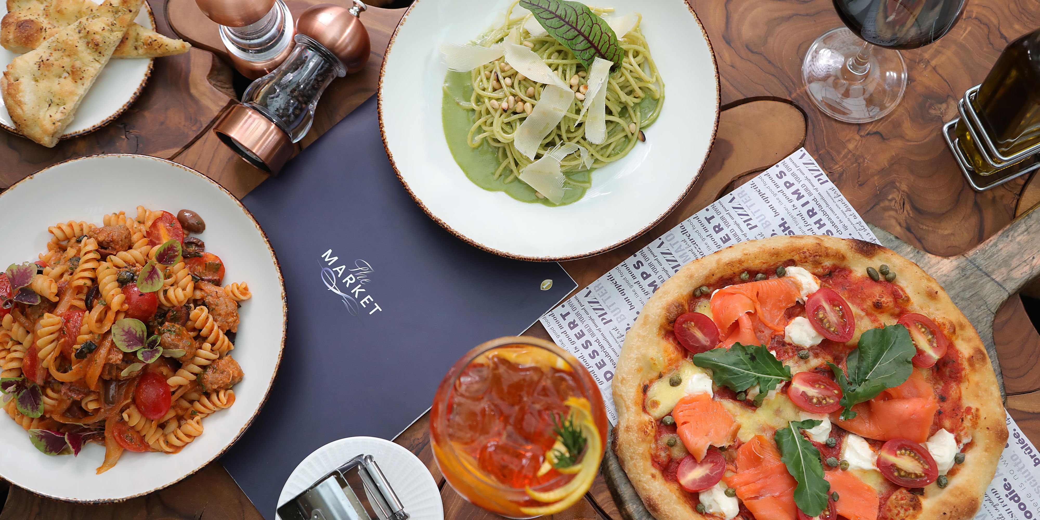 Pizza and pasta dishes among The Market menu.