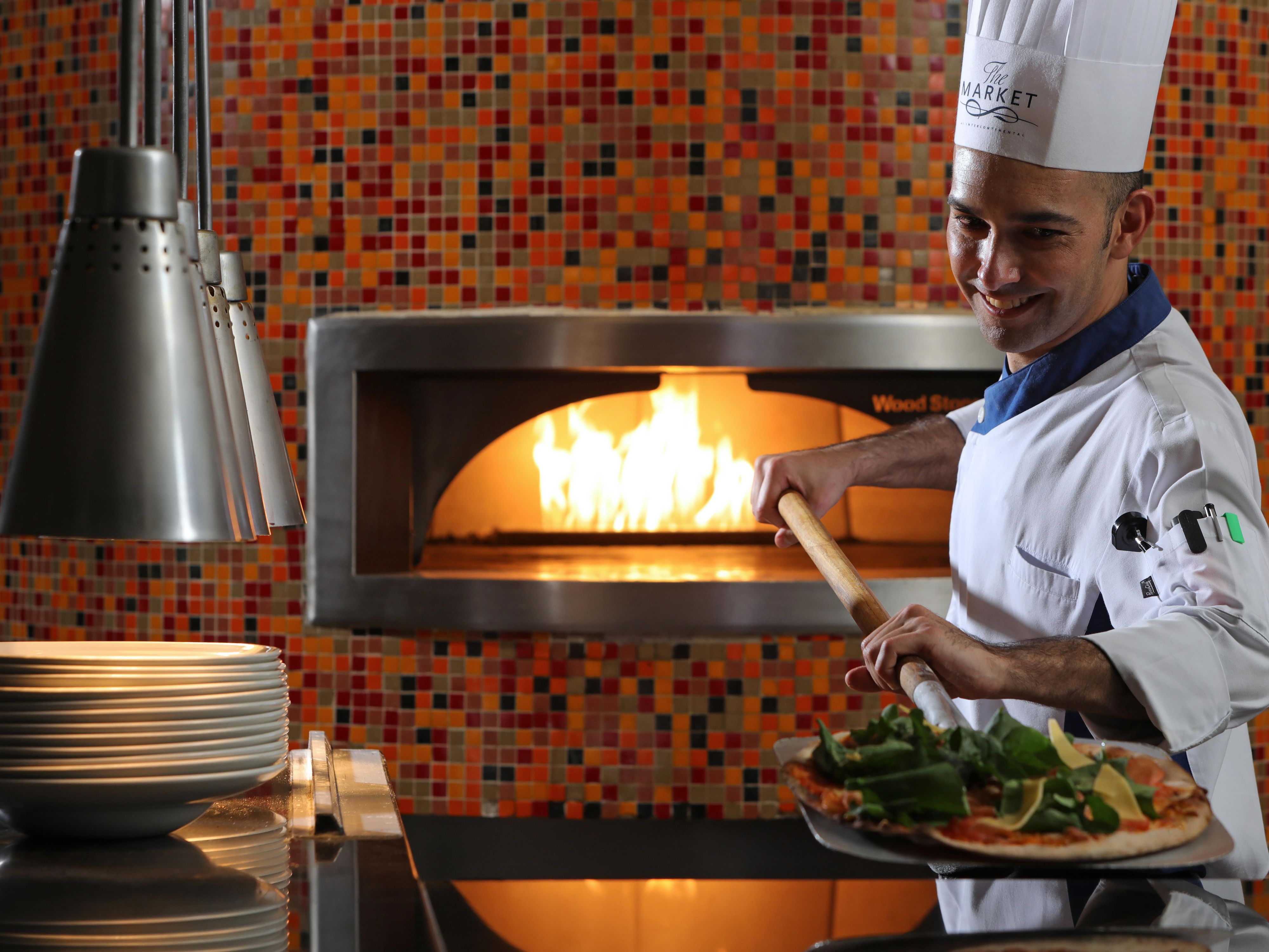 Get one of our hand-crafted brick oven baked pizzas.