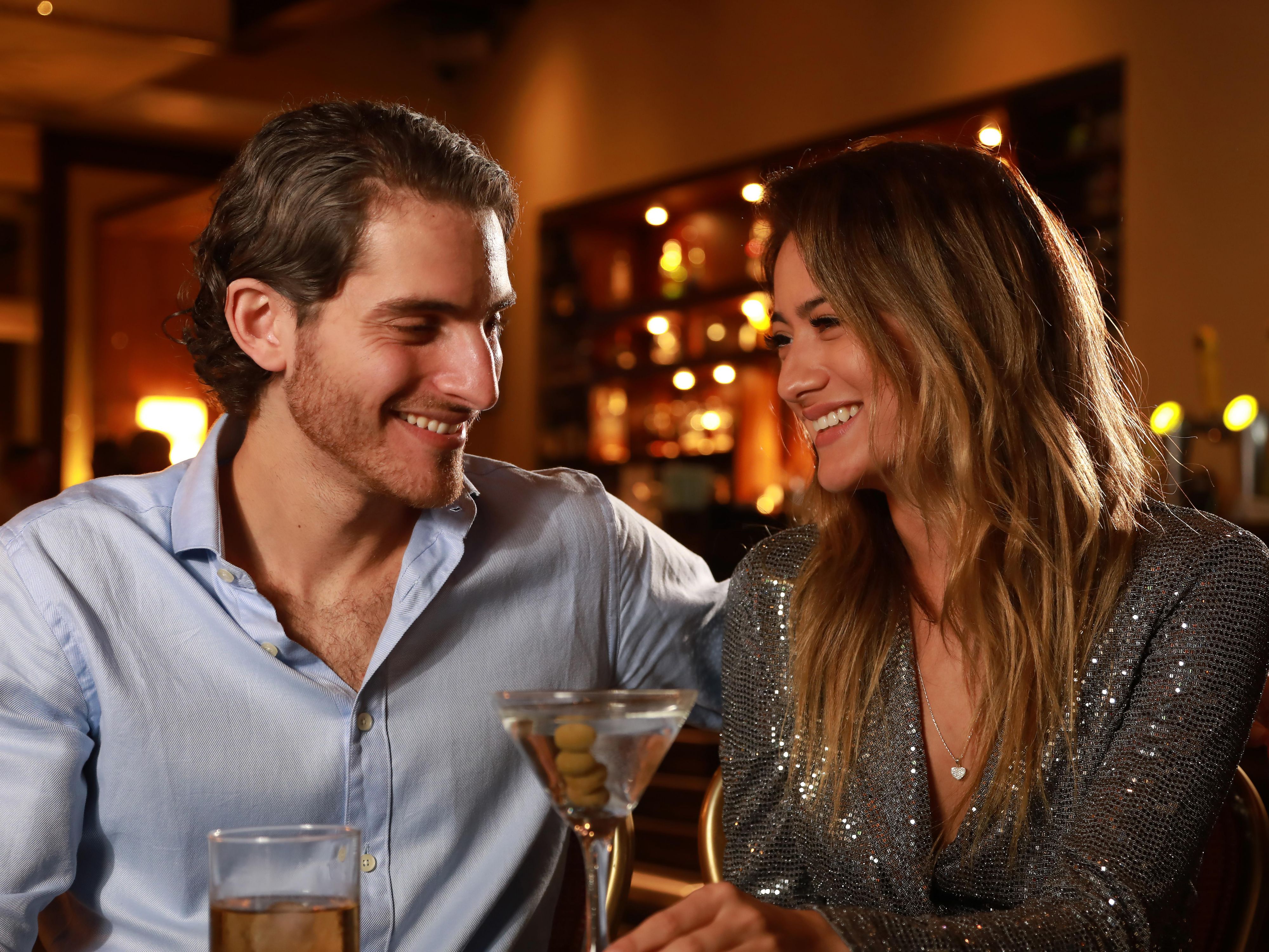 Couples enjoying a cocktail.
